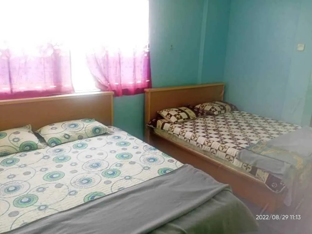 Bedroom in OYO 90471 Hotel Tepoh