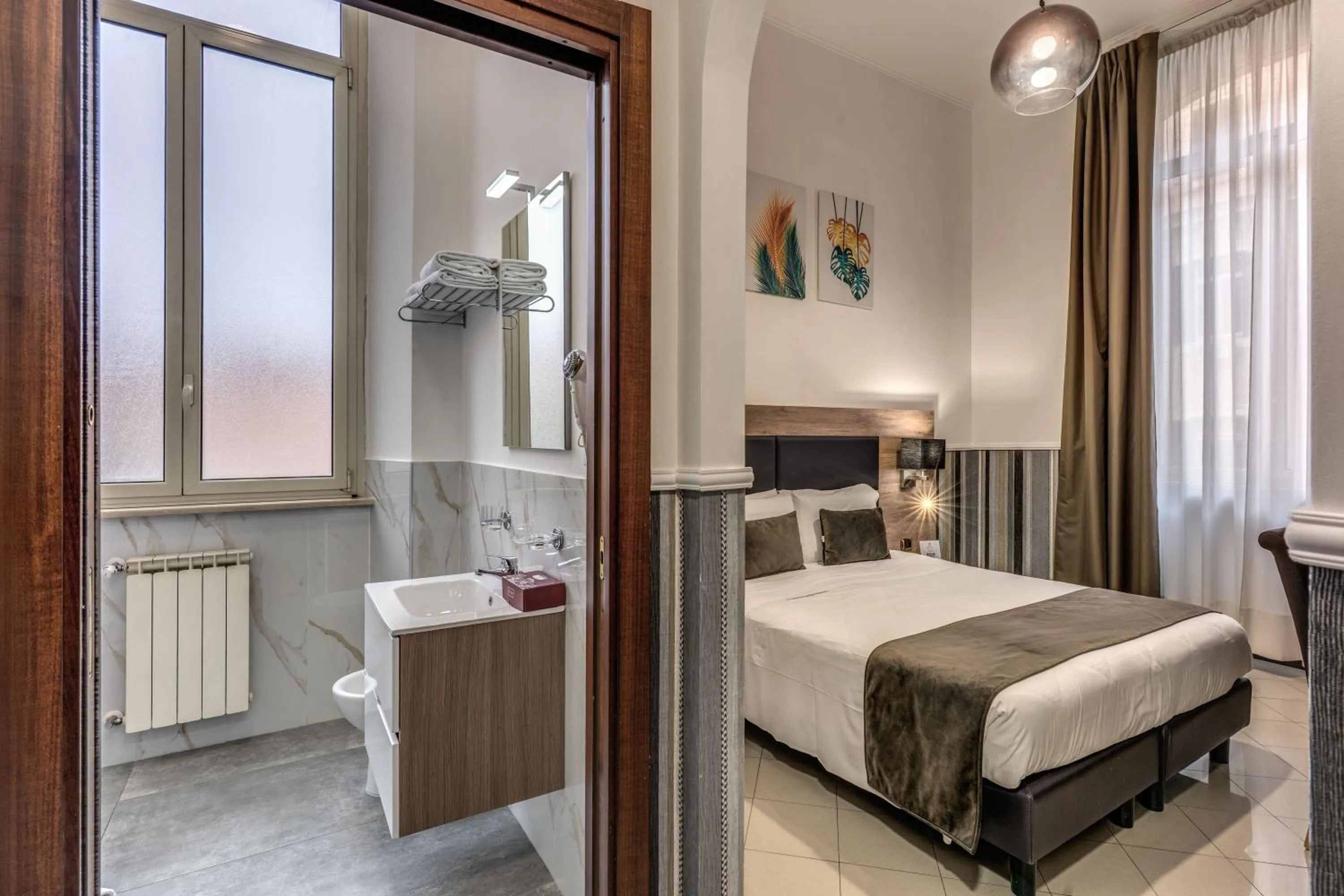 Bed in Hotel Ottaviano Augusto