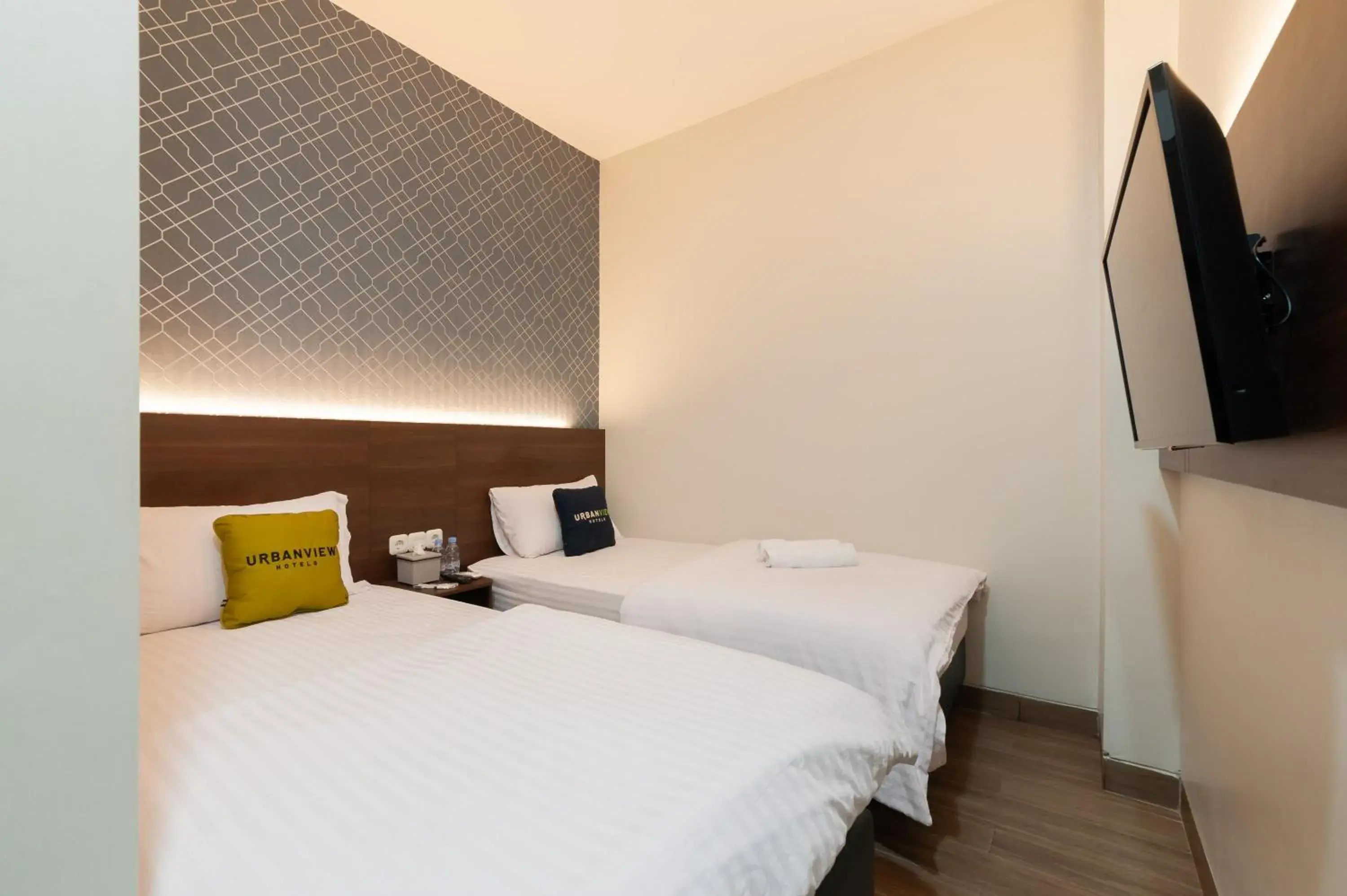 Bed in Urbanview Hotel Cengkareng Jakarta by RedDoorz Bed in Urbanview Hotel Cengkareng Jakarta by RedDoorz