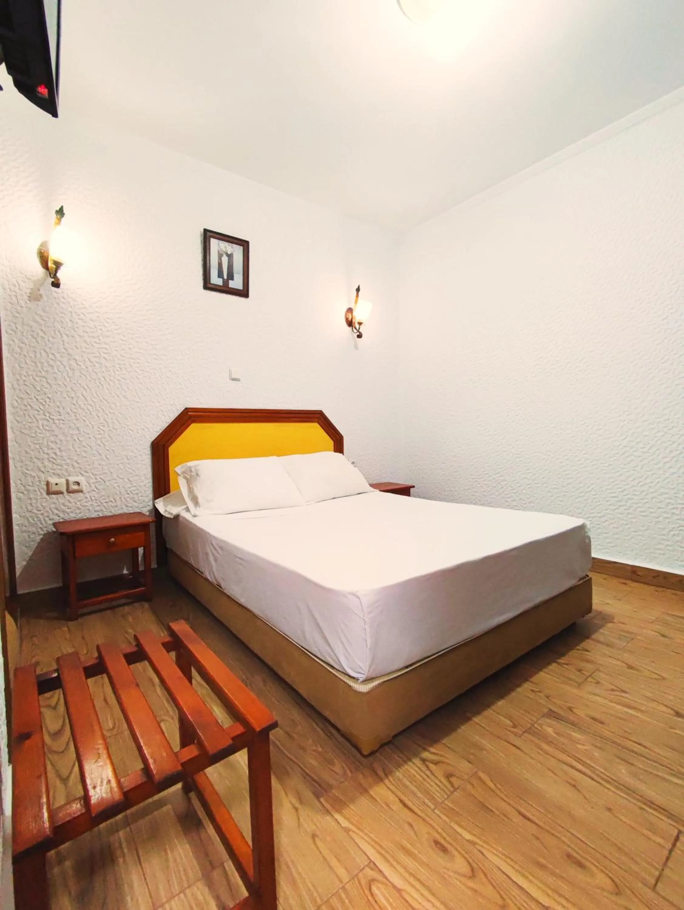 Bed in Hôtel National