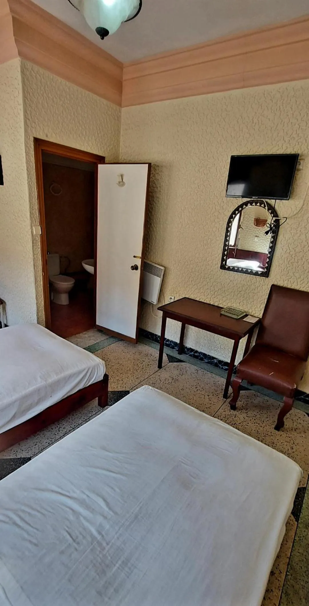 Bed in Hôtel National