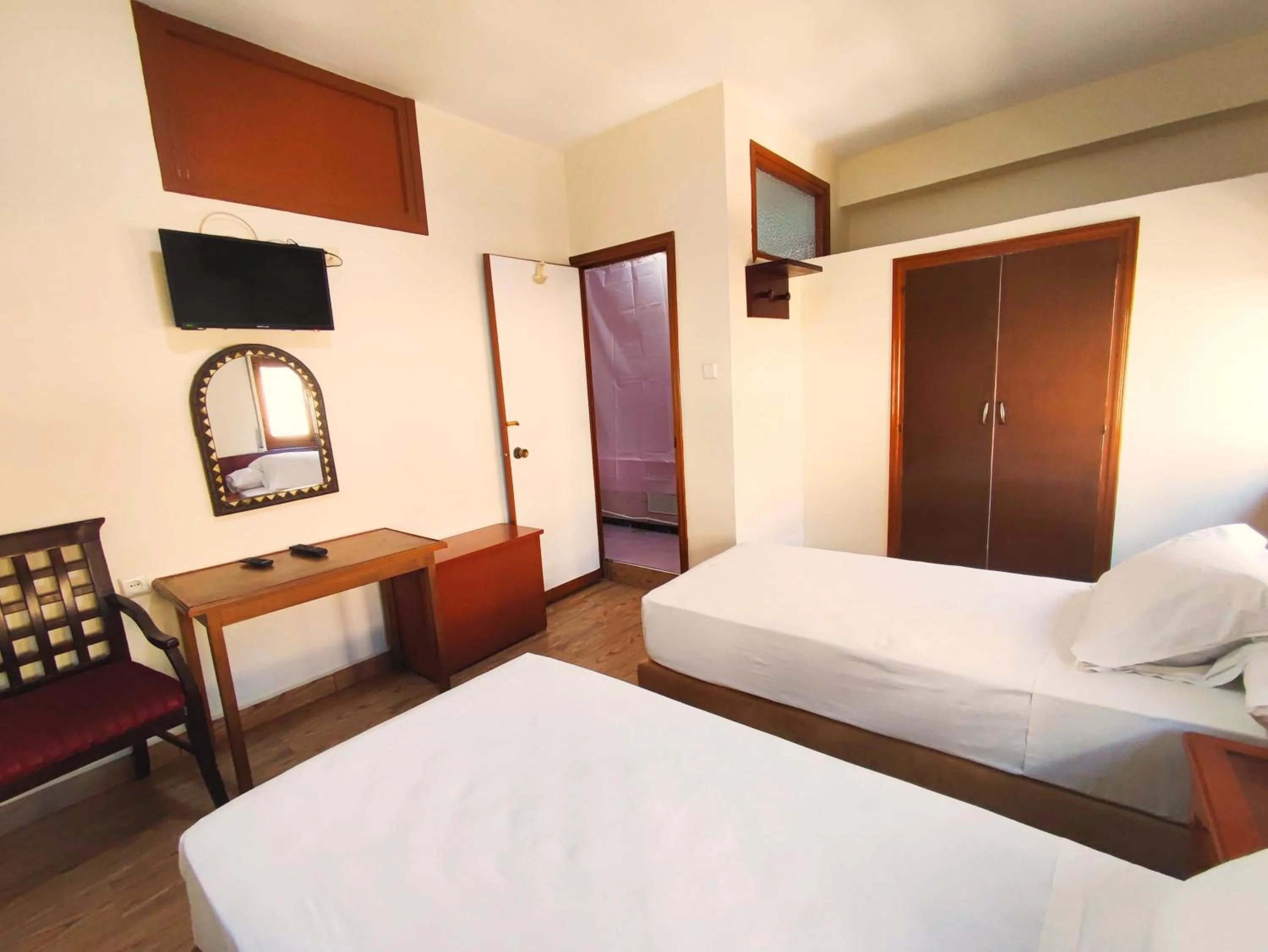 Bed in Hôtel National