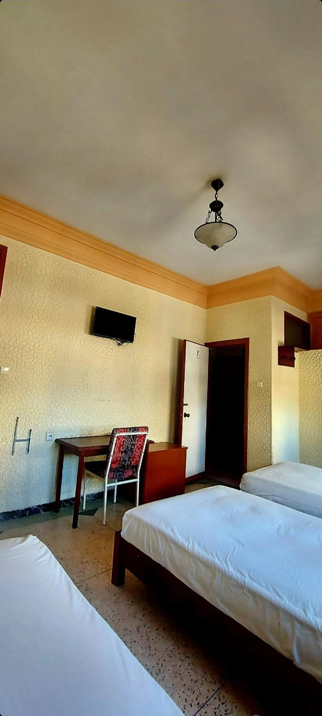 Bed in Hôtel National