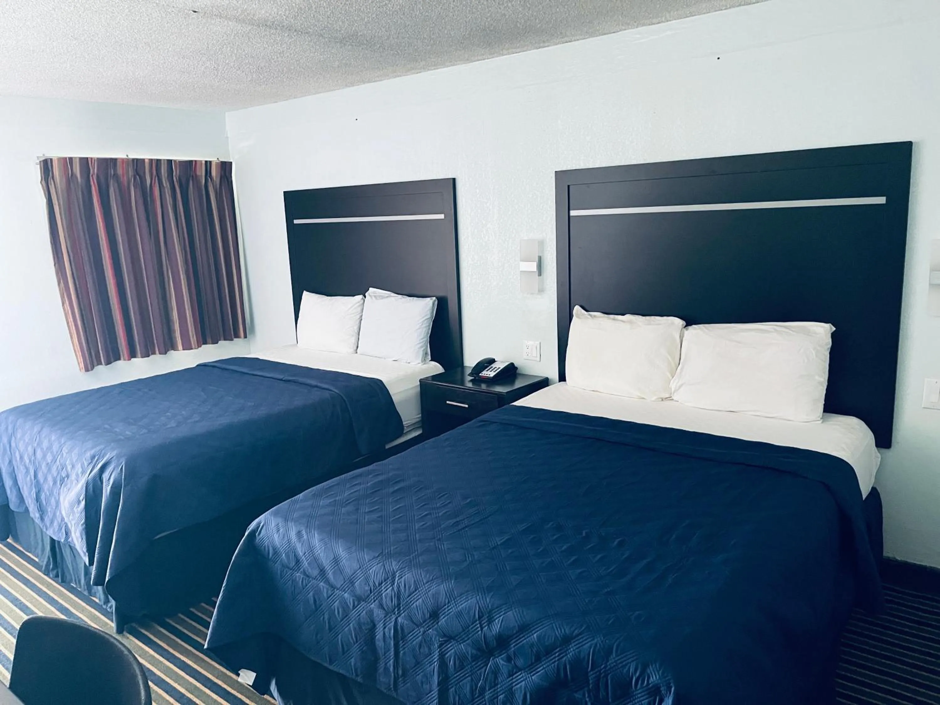 Bed in Executive Inn