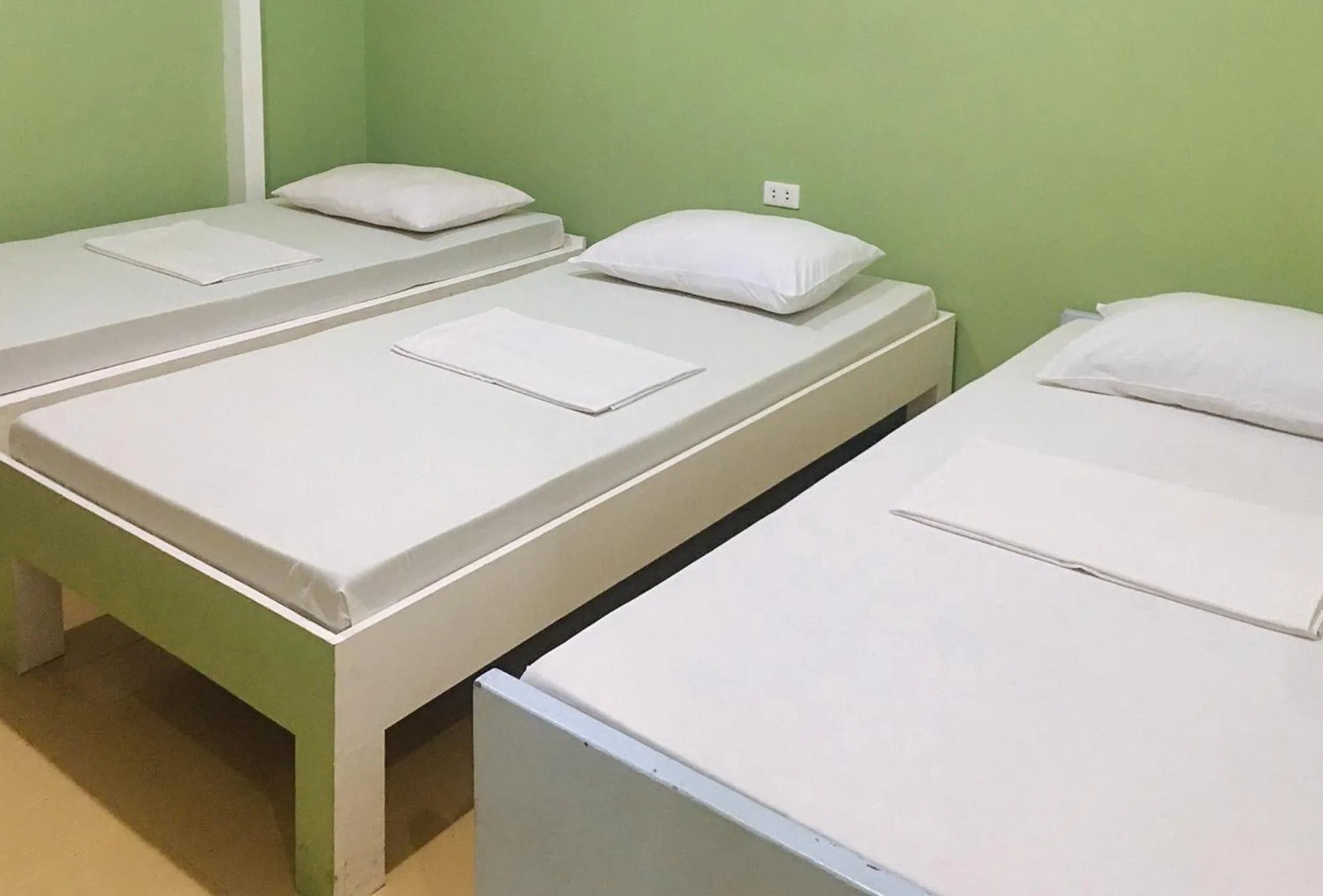 Bedroom, Bed in Mainstreet Pension House by RedDoorz