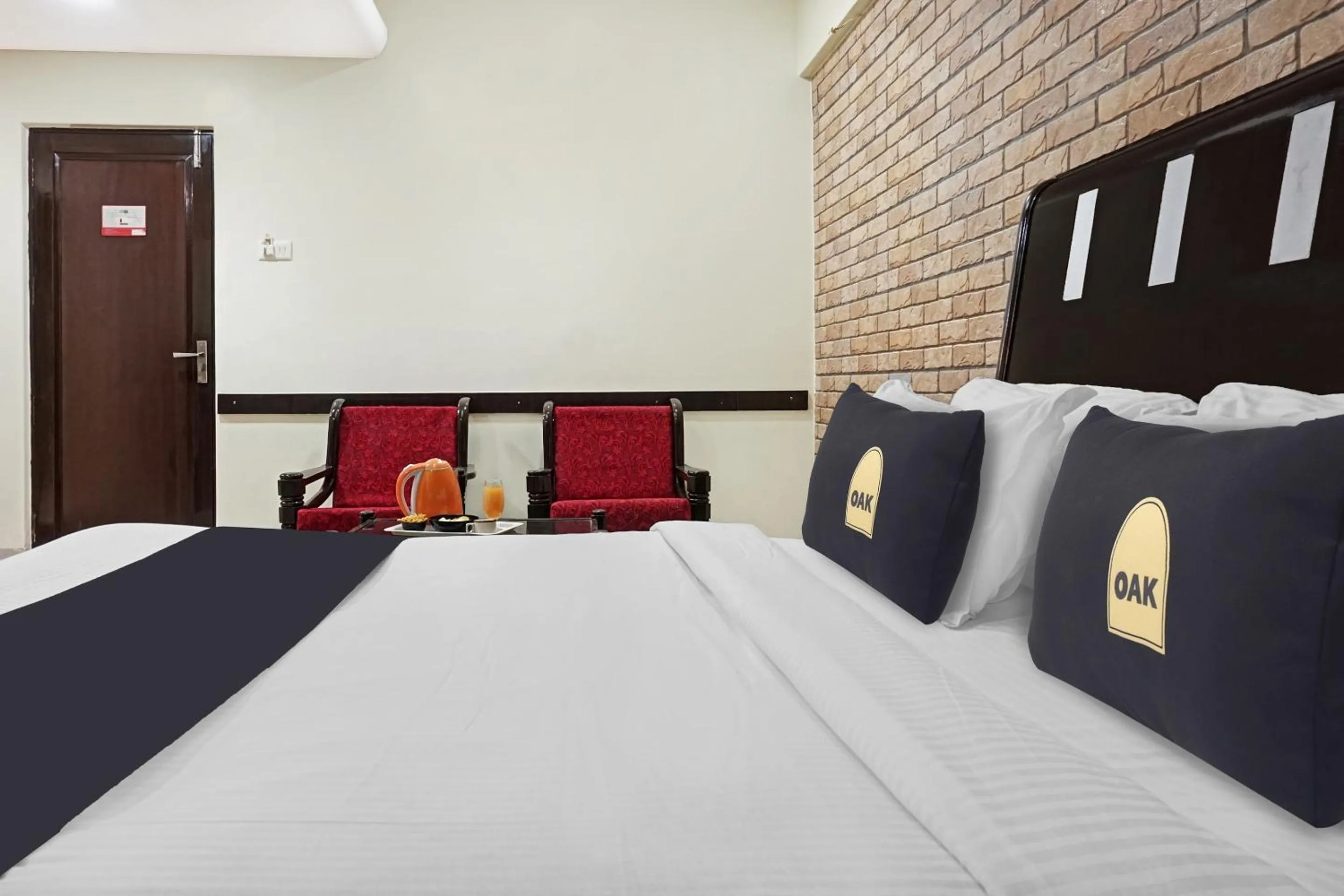 Bedroom, Bed in Super Townhouse OAK Gharonda Residency Near Sant Tukaram Nagar Metro Station