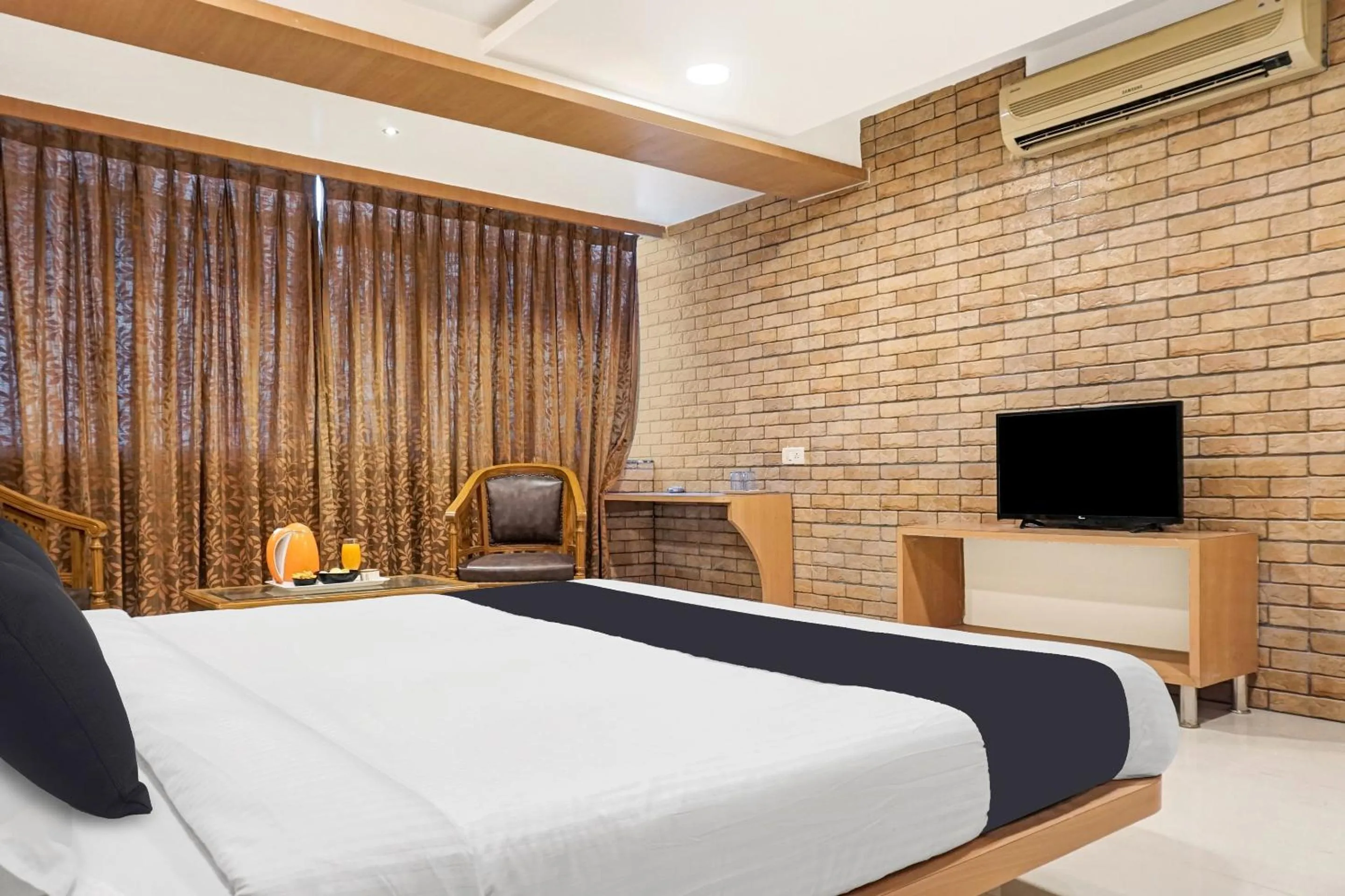 Bedroom, Bed in Super Townhouse OAK Gharonda Residency Near Sant Tukaram Nagar Metro Station