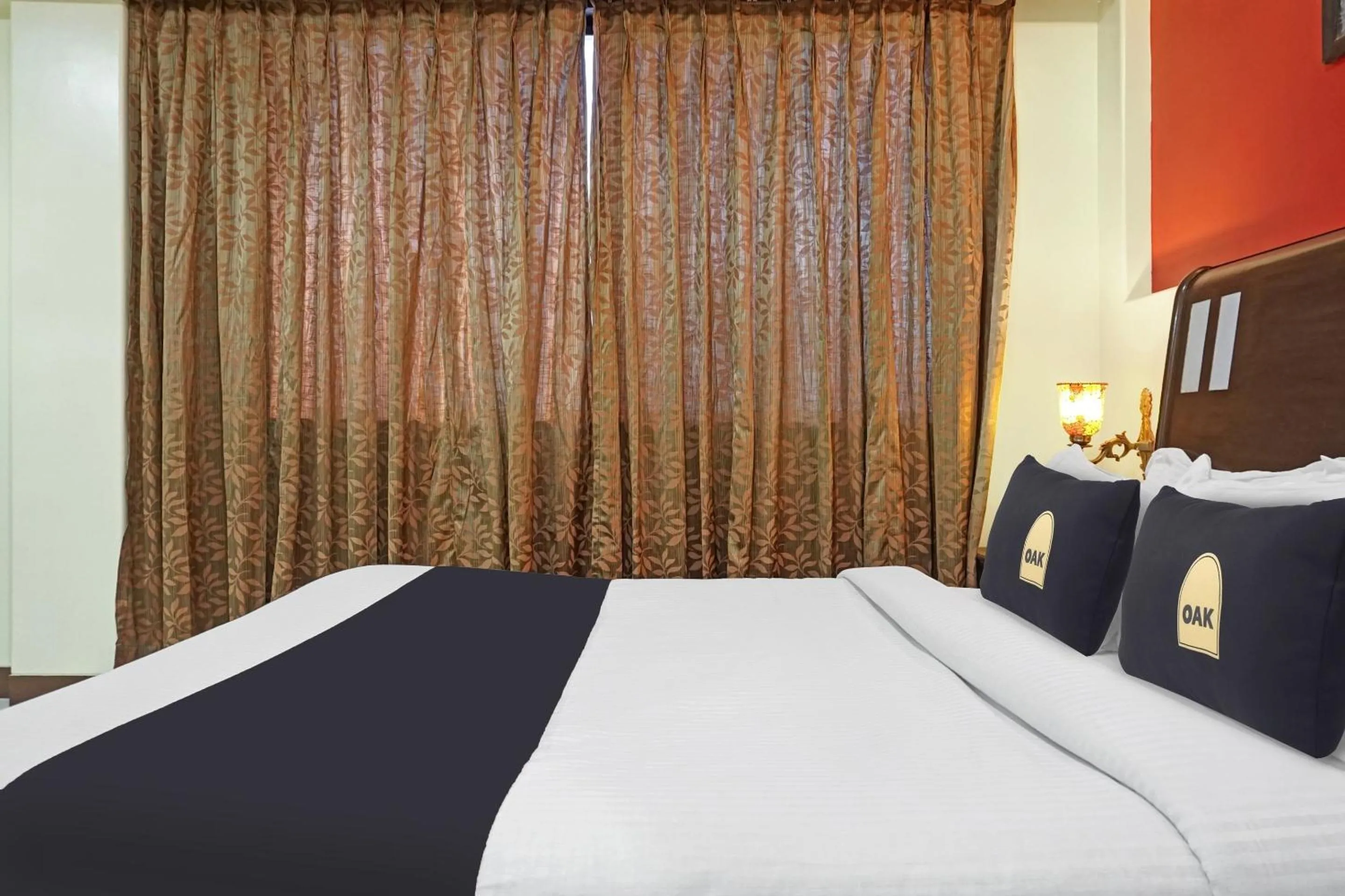 Deluxe Triple Room - single occupancy in Townhouse OAK Gharonda Residency Near Sant Tukaram Nagar Metro Station