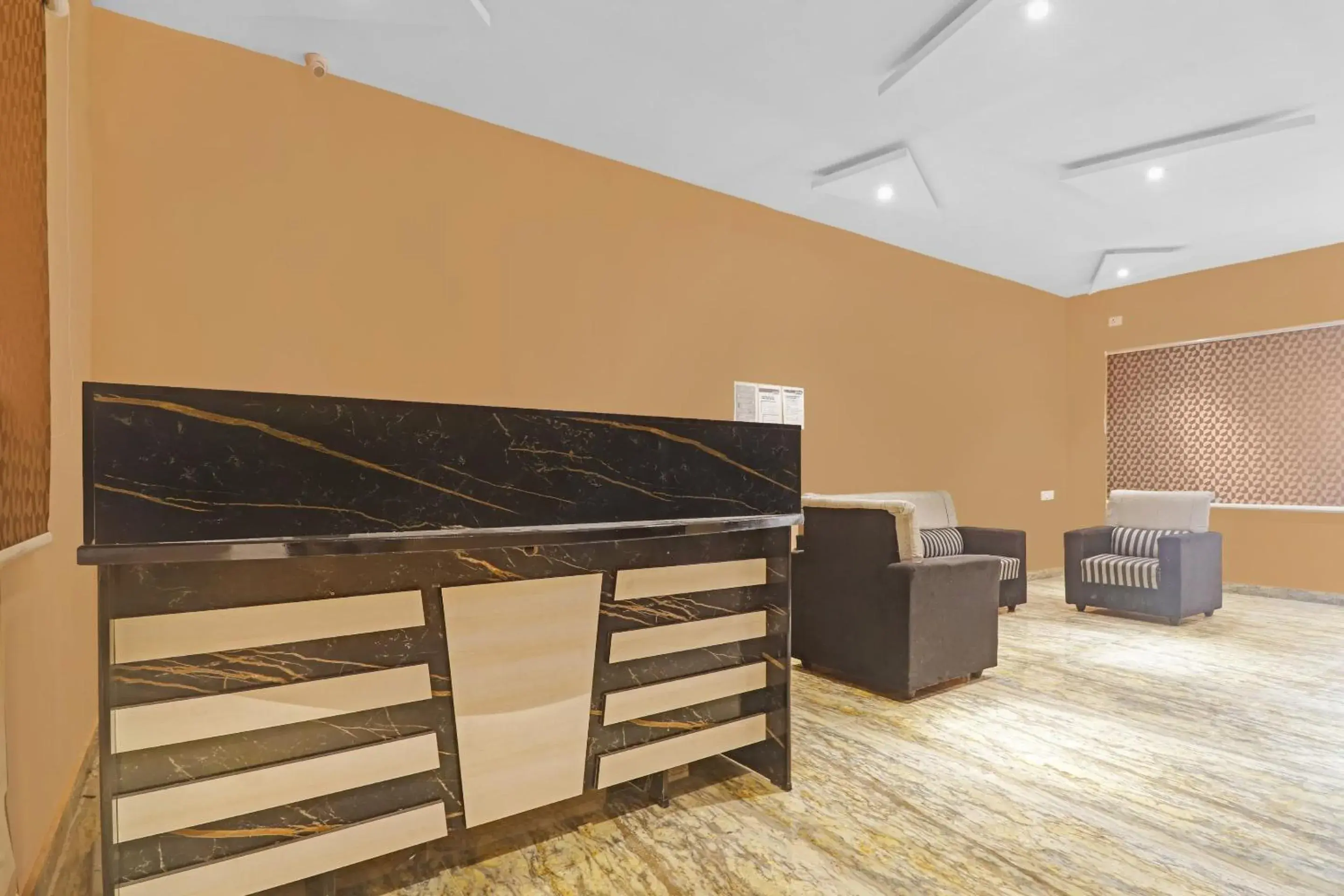 Lobby or reception in Capital O Sai Balaji Near Golconda Fort Lobby or reception in Capital O Sai Balaji Near Golconda Fort