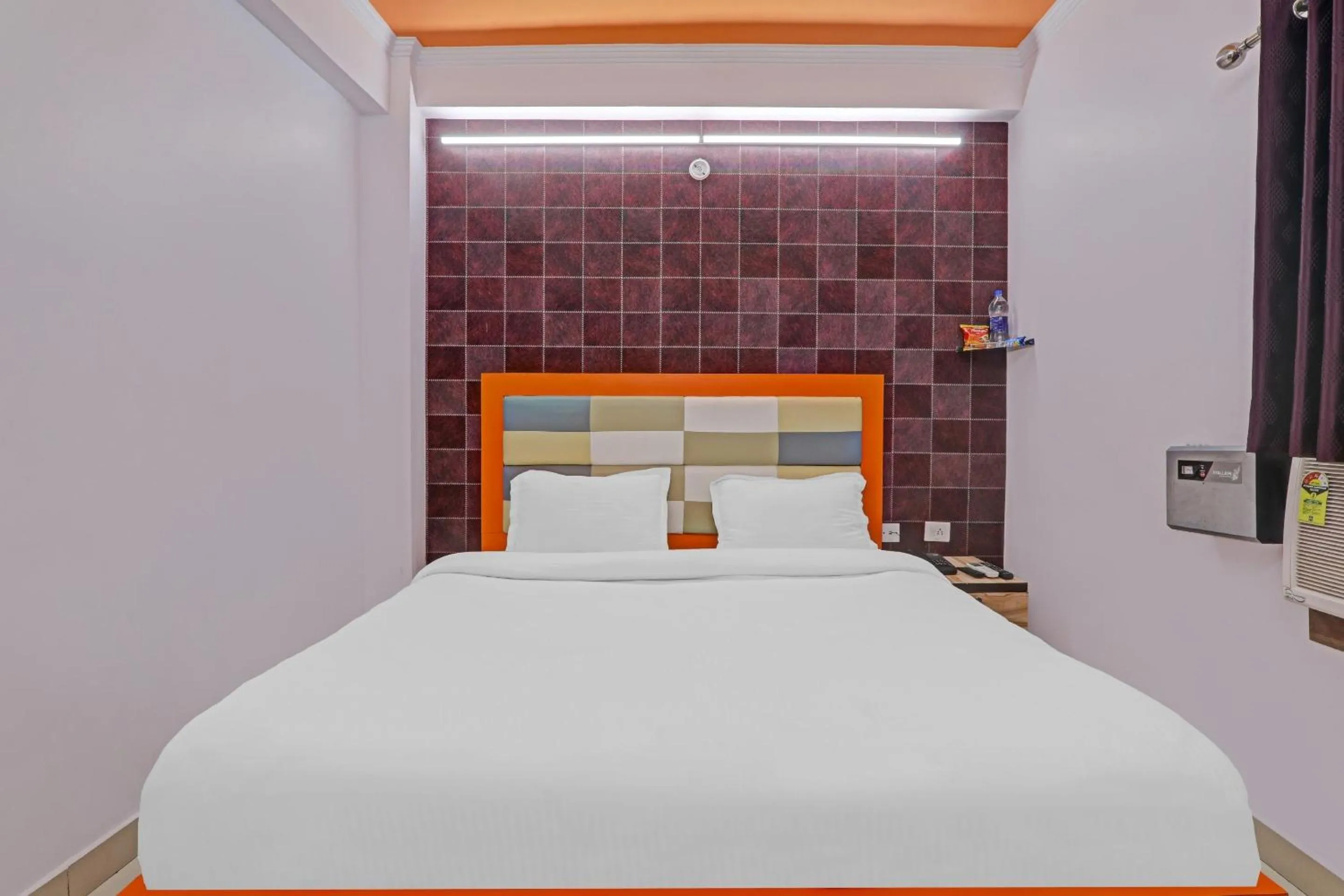 Bedroom in OYO Flagship 86660 Hotel RK Grand