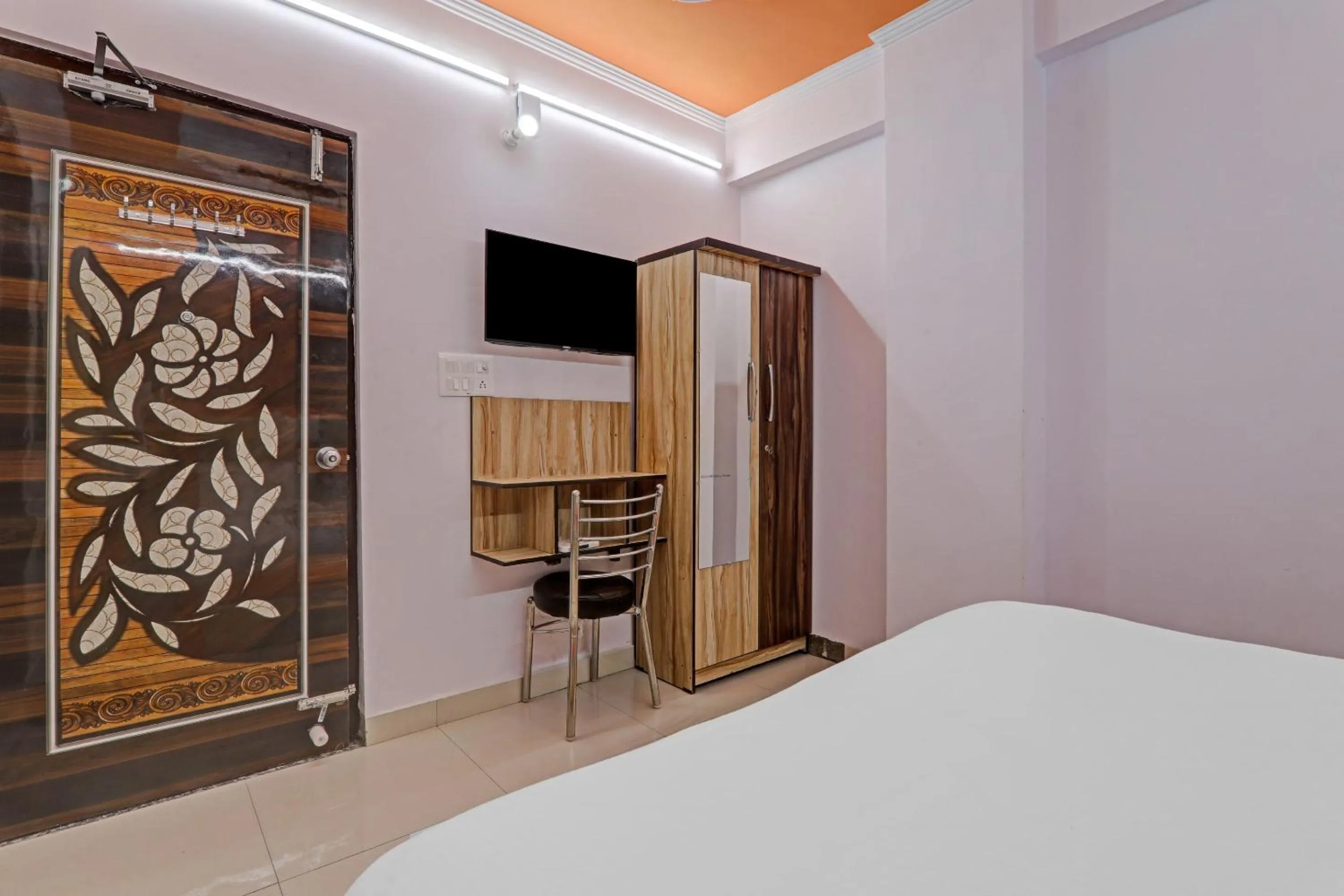 Bedroom in OYO Flagship 86660 Hotel RK Grand