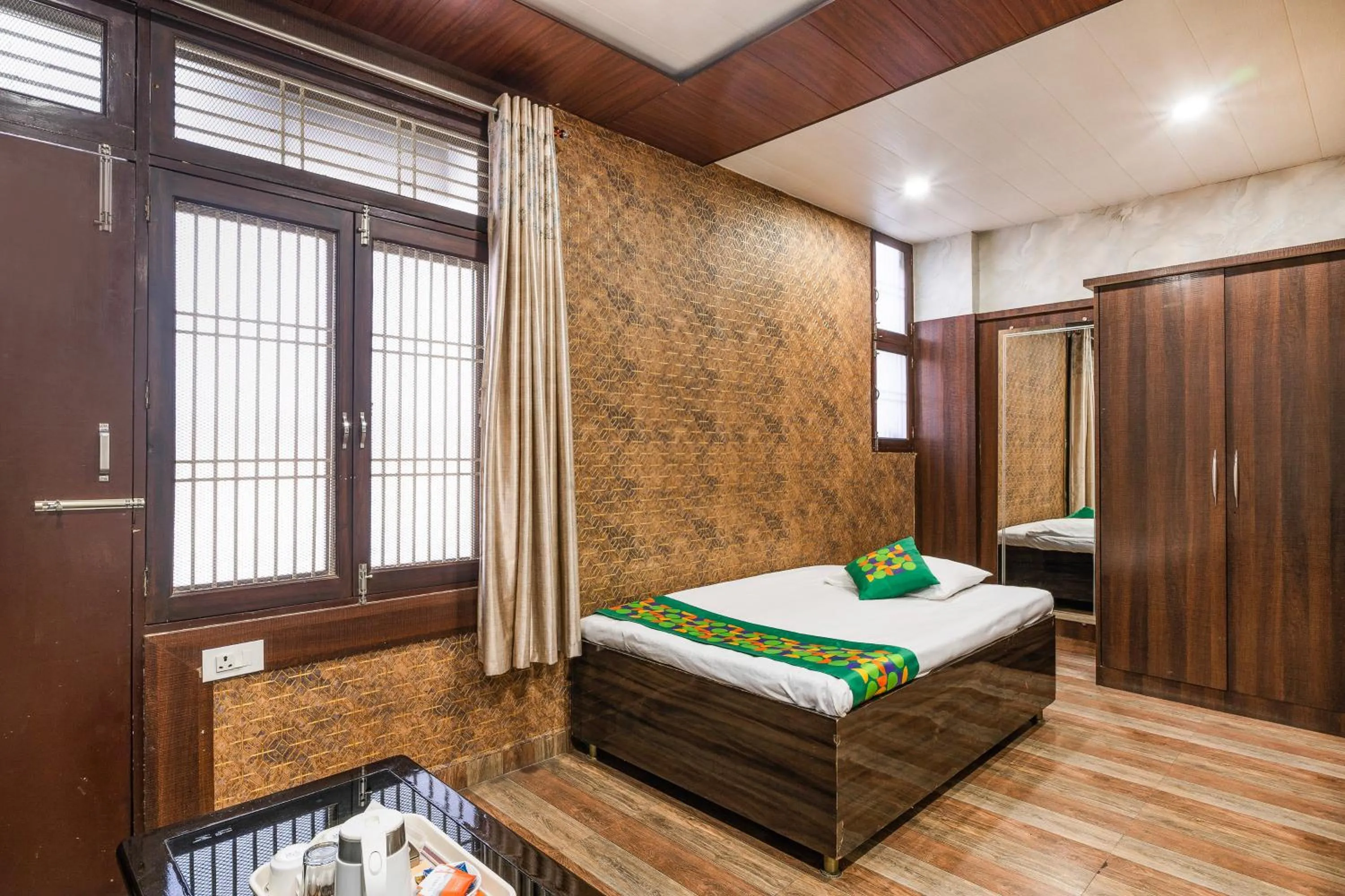 Spacious Premium Room - single occupancy in Treebo Saumendra Residency
