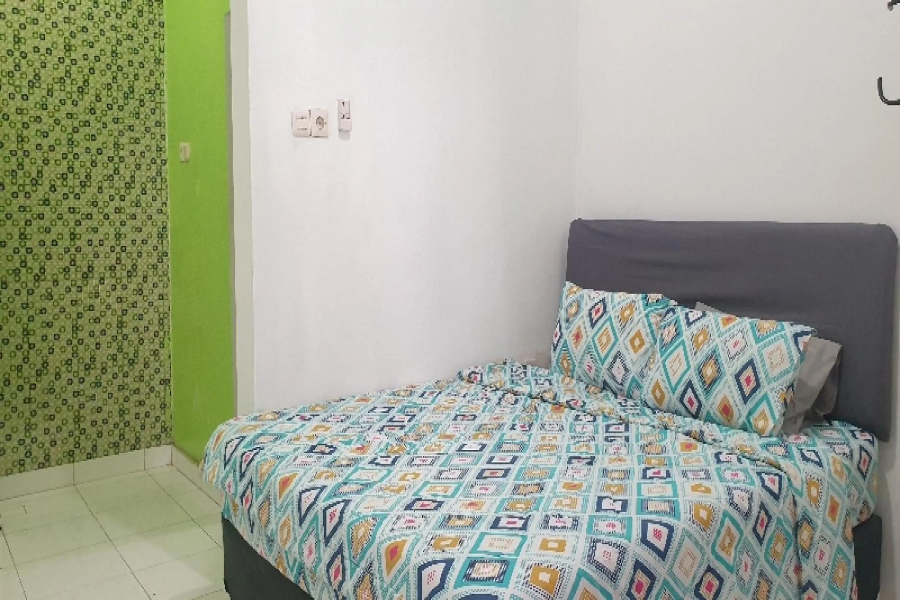 Bedroom in OYO 90990 Surya Residence