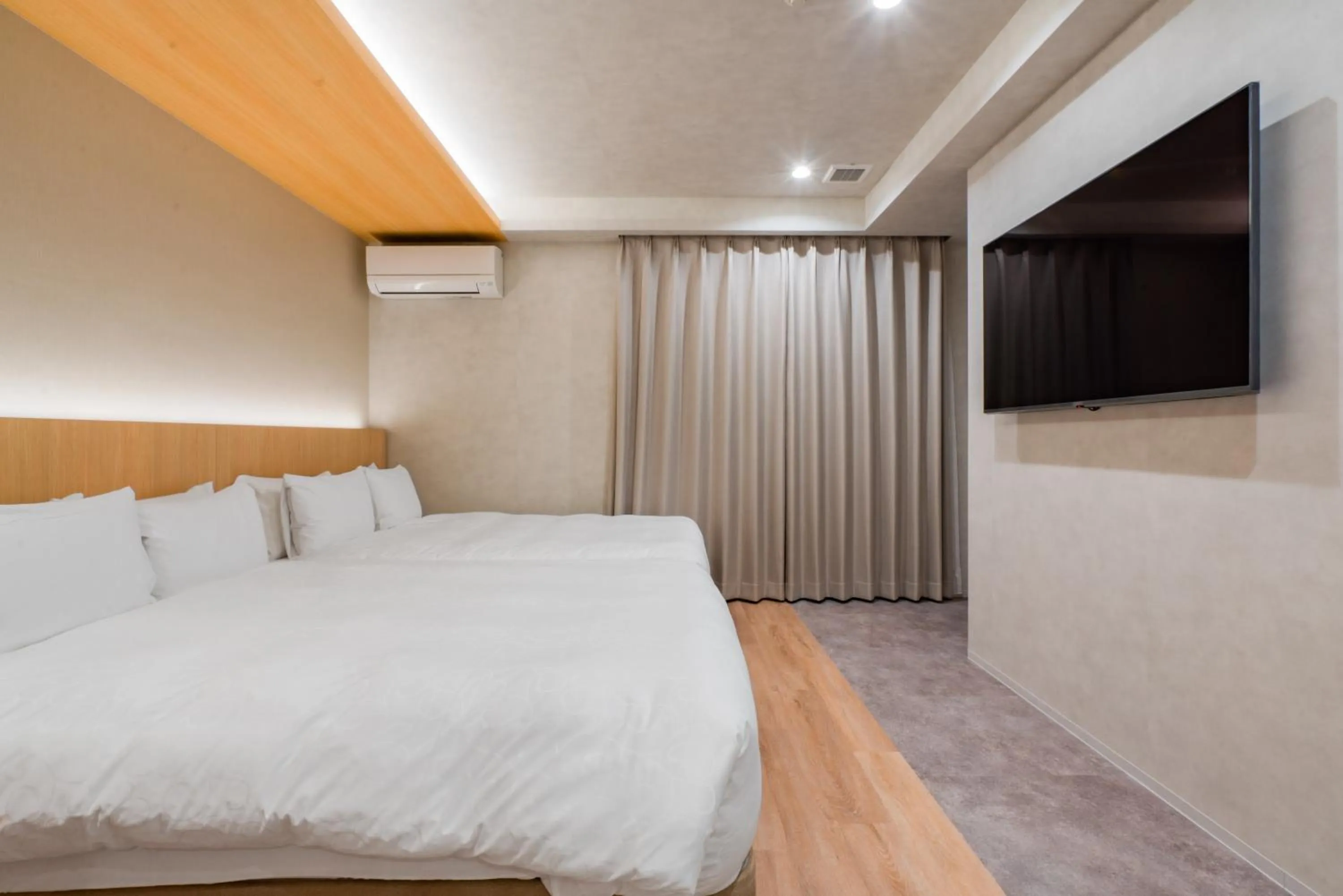 Bed in Randor Hotel Hiroshima Prestige