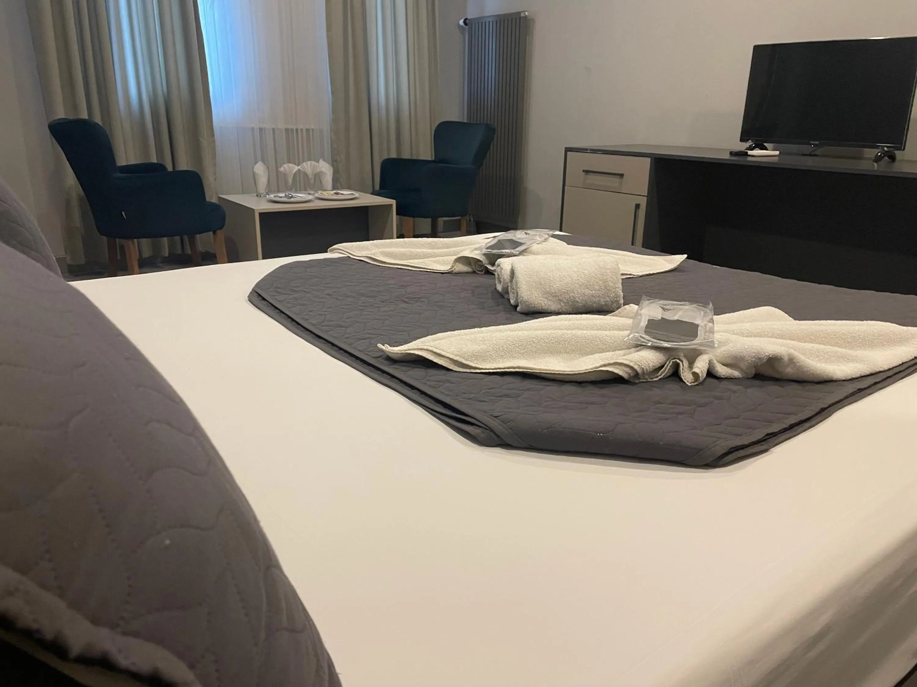 Bed in Agora Royal Residence