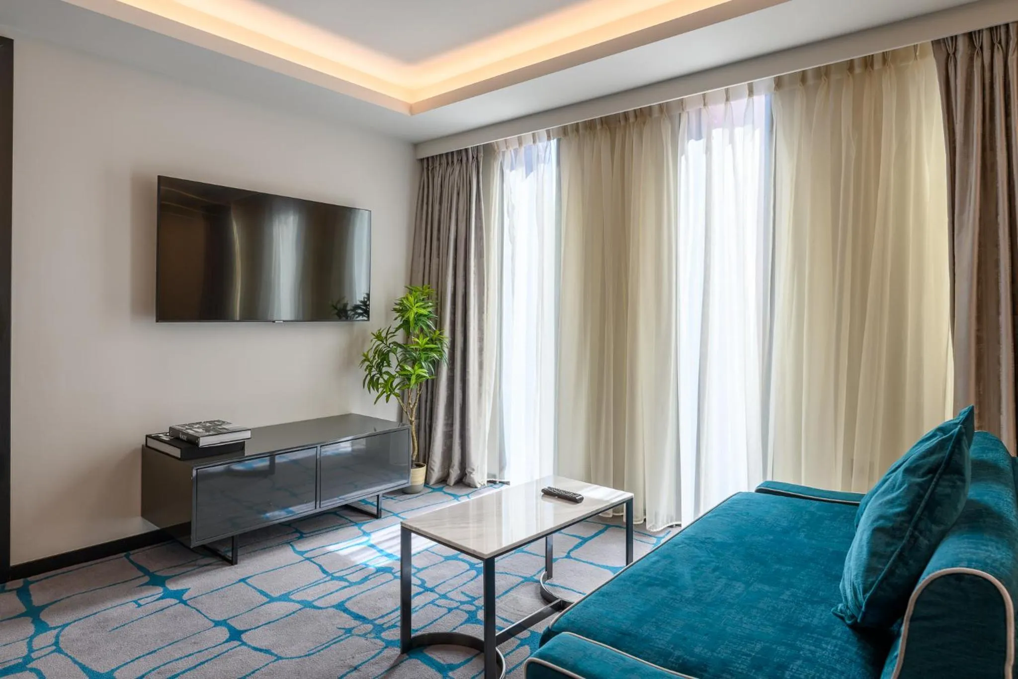 Communal lounge/ TV room in Dao by Dorsett West London