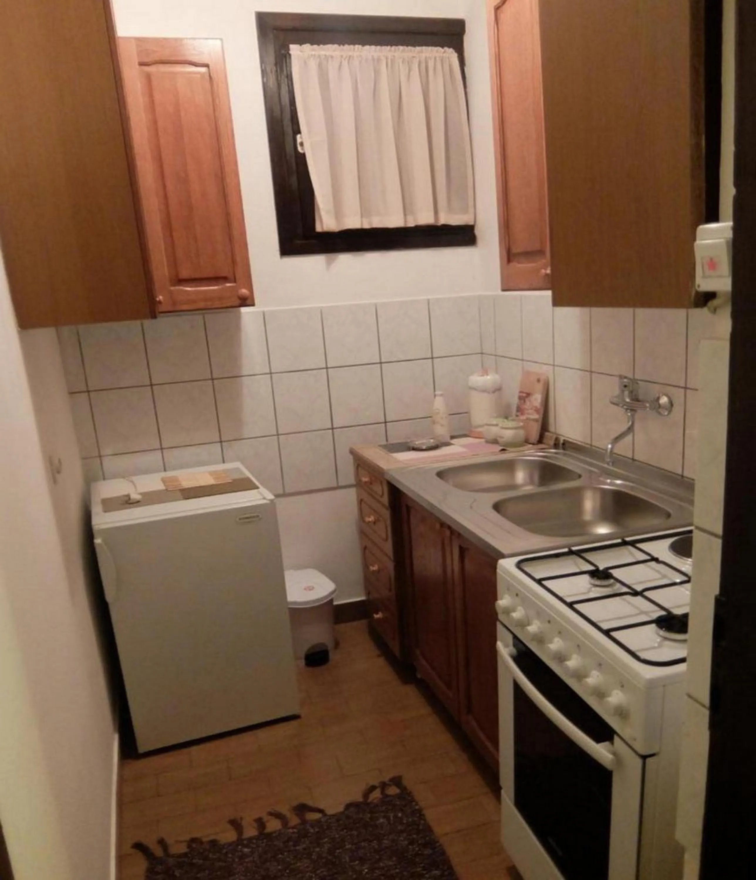 Kitchen or kitchenette in Apartments & Rooms Rendulić