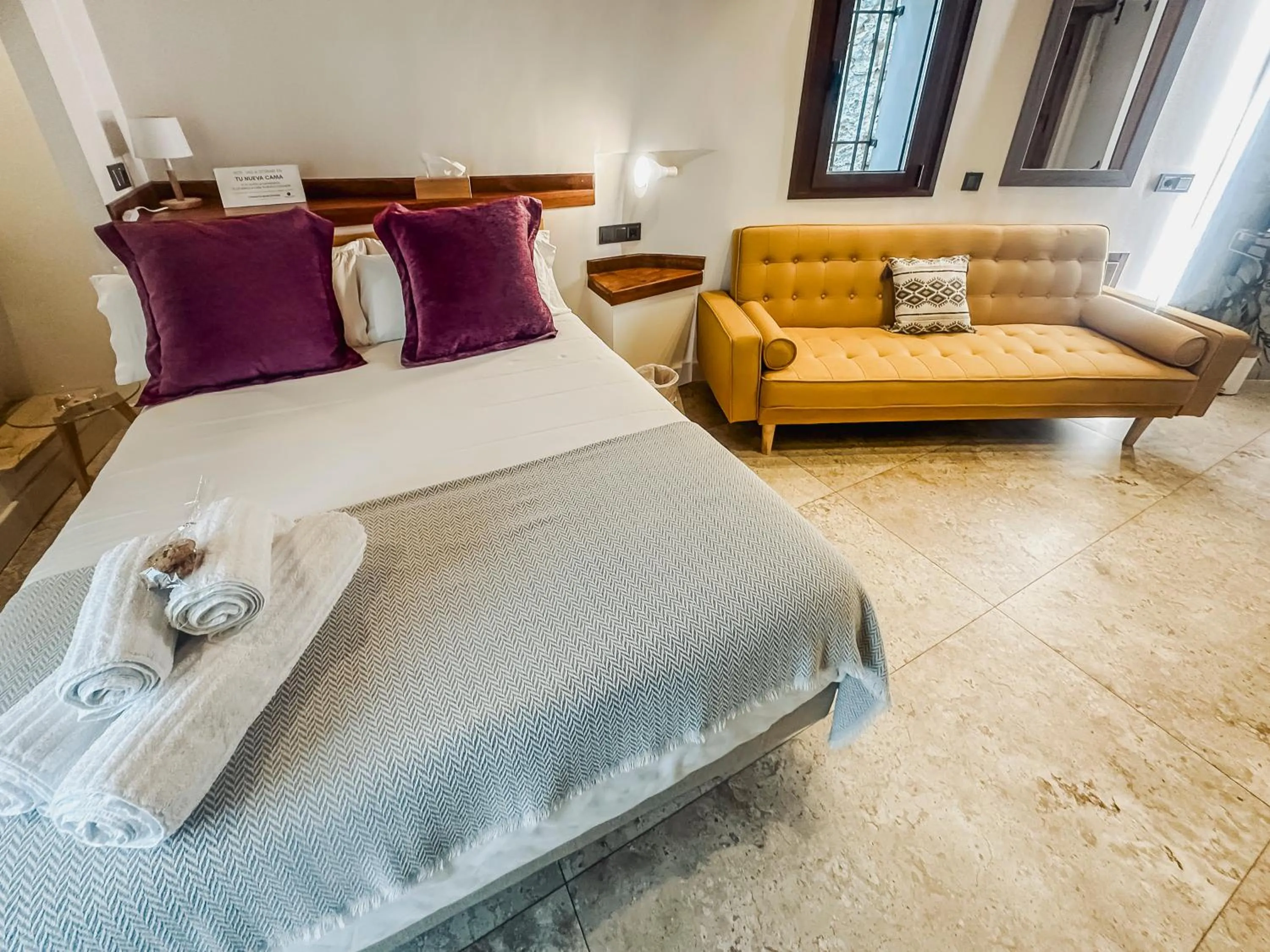 Bed in Hotel Boutique Poeta Jorge Manrique