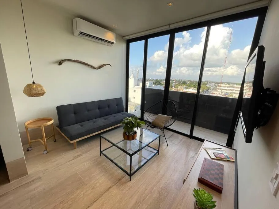 Living room in Brand New Condo with Rooftop Pool