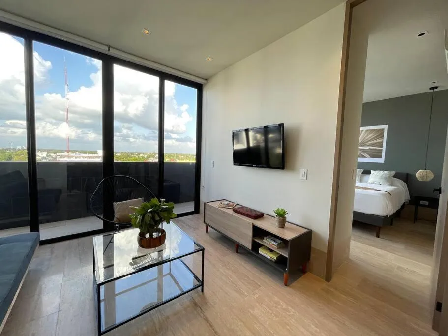 Communal lounge/ TV room, Bed in Brand New Condo with Rooftop Pool