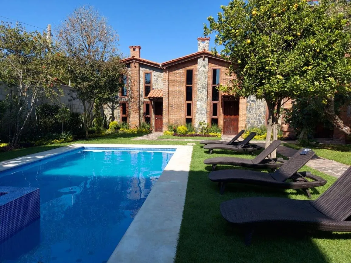 Pool view in Cabañas Doña Anita