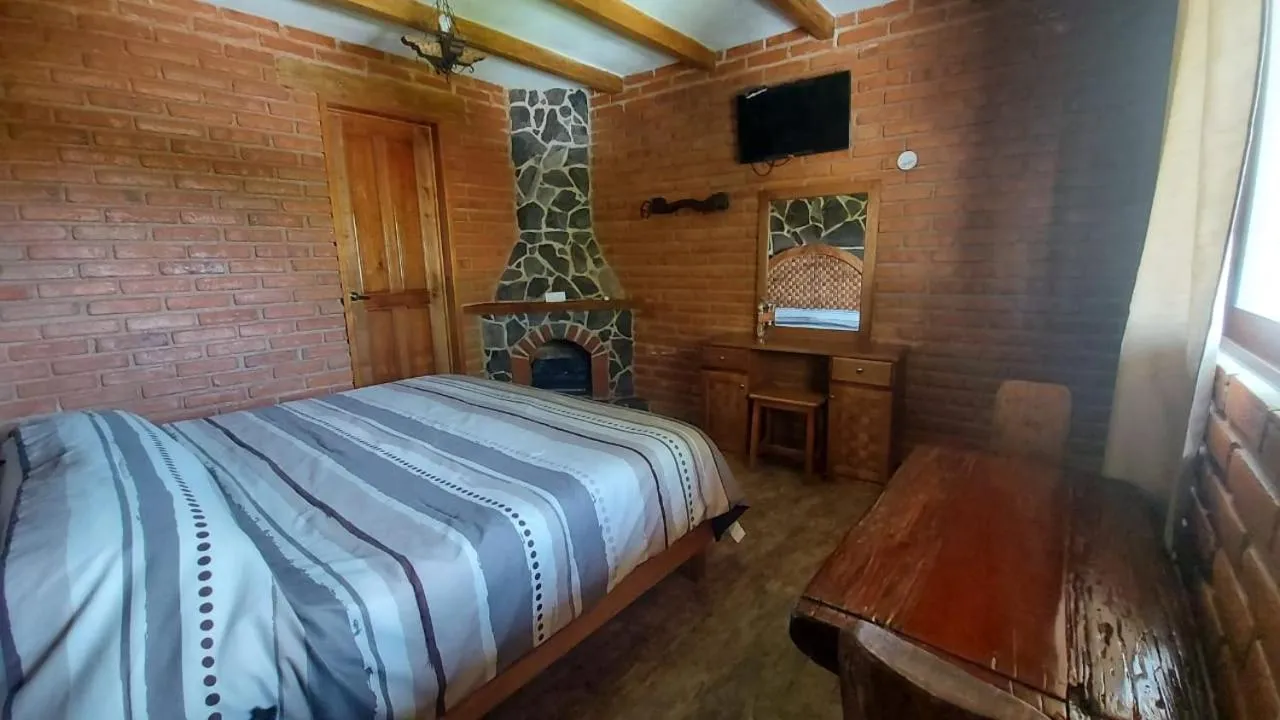 Bed in Cabañas Doña Anita