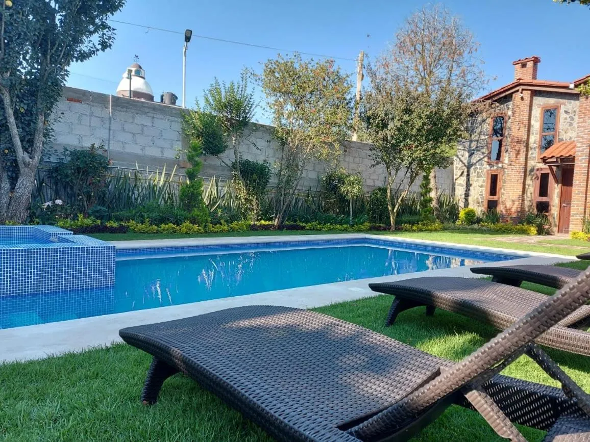 Swimming pool in Cabañas Doña Anita