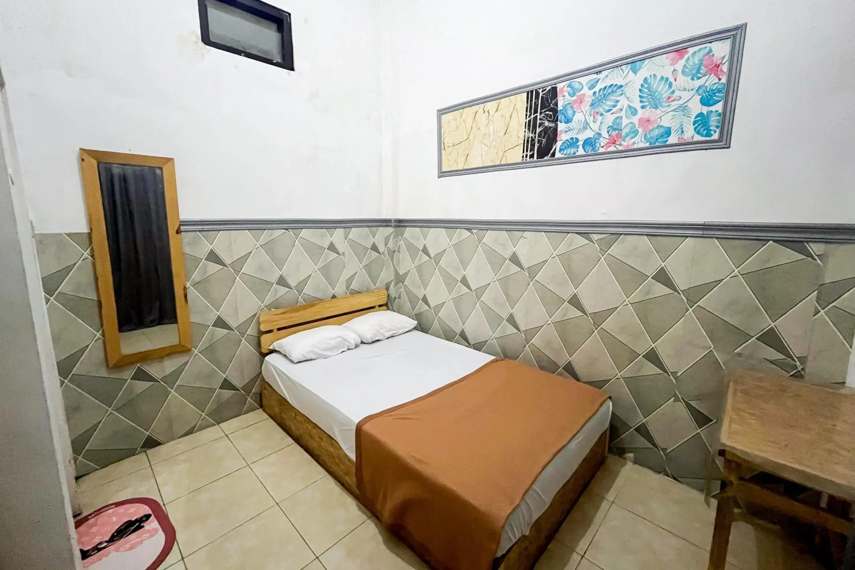 Forzando House Redpartner near Universitas Muhammadiyah Malang Forzando House Redpartner near Universitas Muhammadiyah Malang