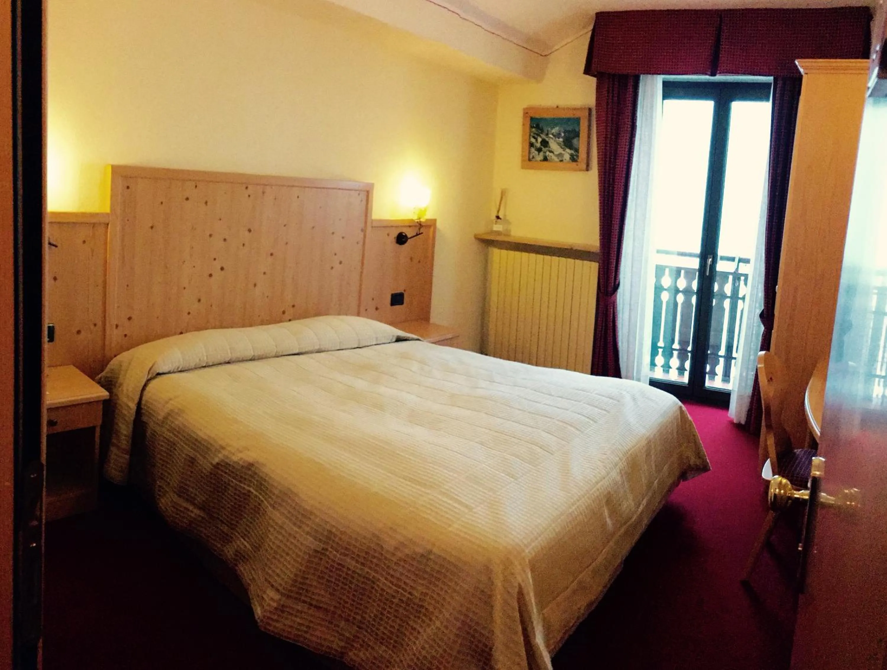 Photo of the whole room, Bed in Hotel Ristorante Miramonti