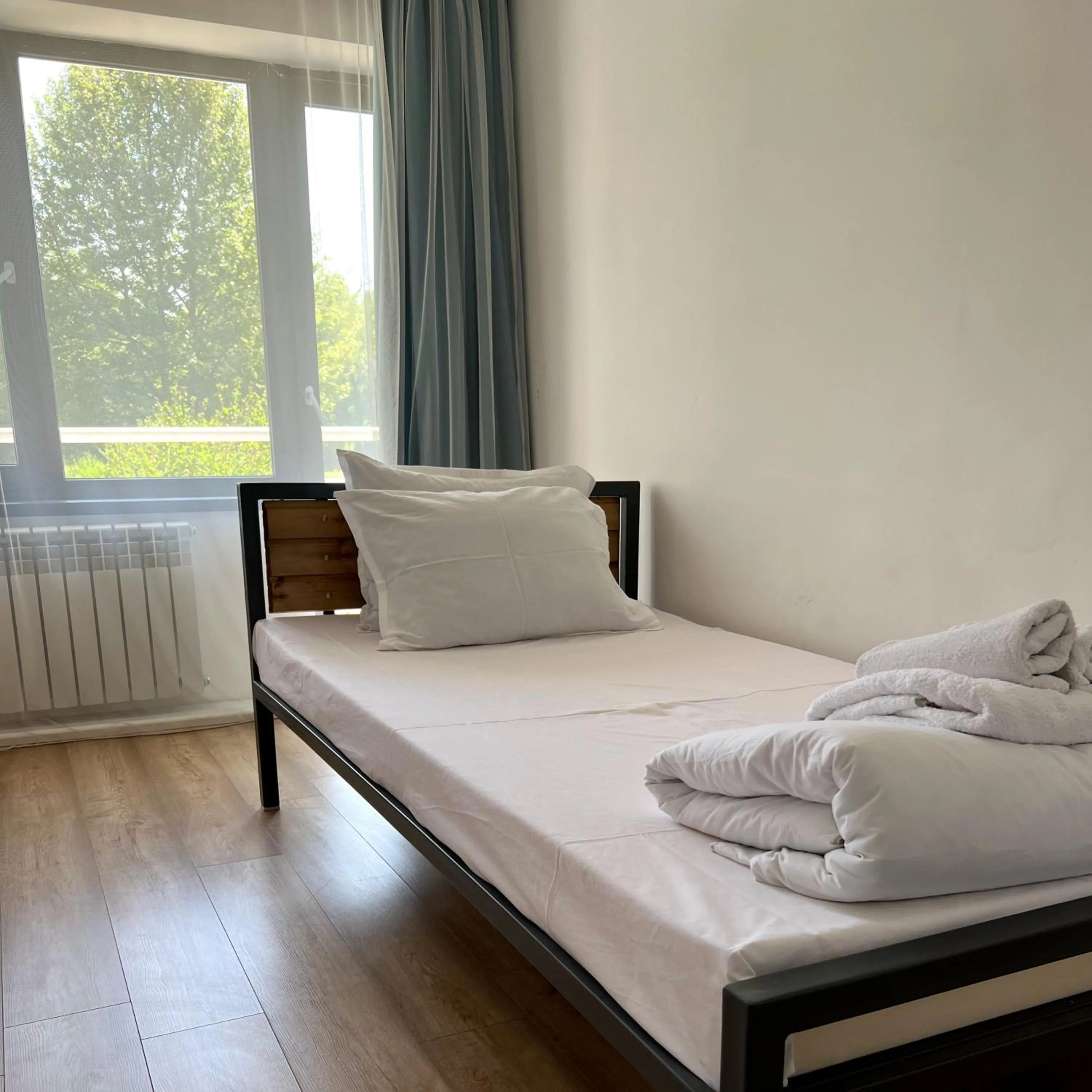 Bed in TOURIST HOTEL