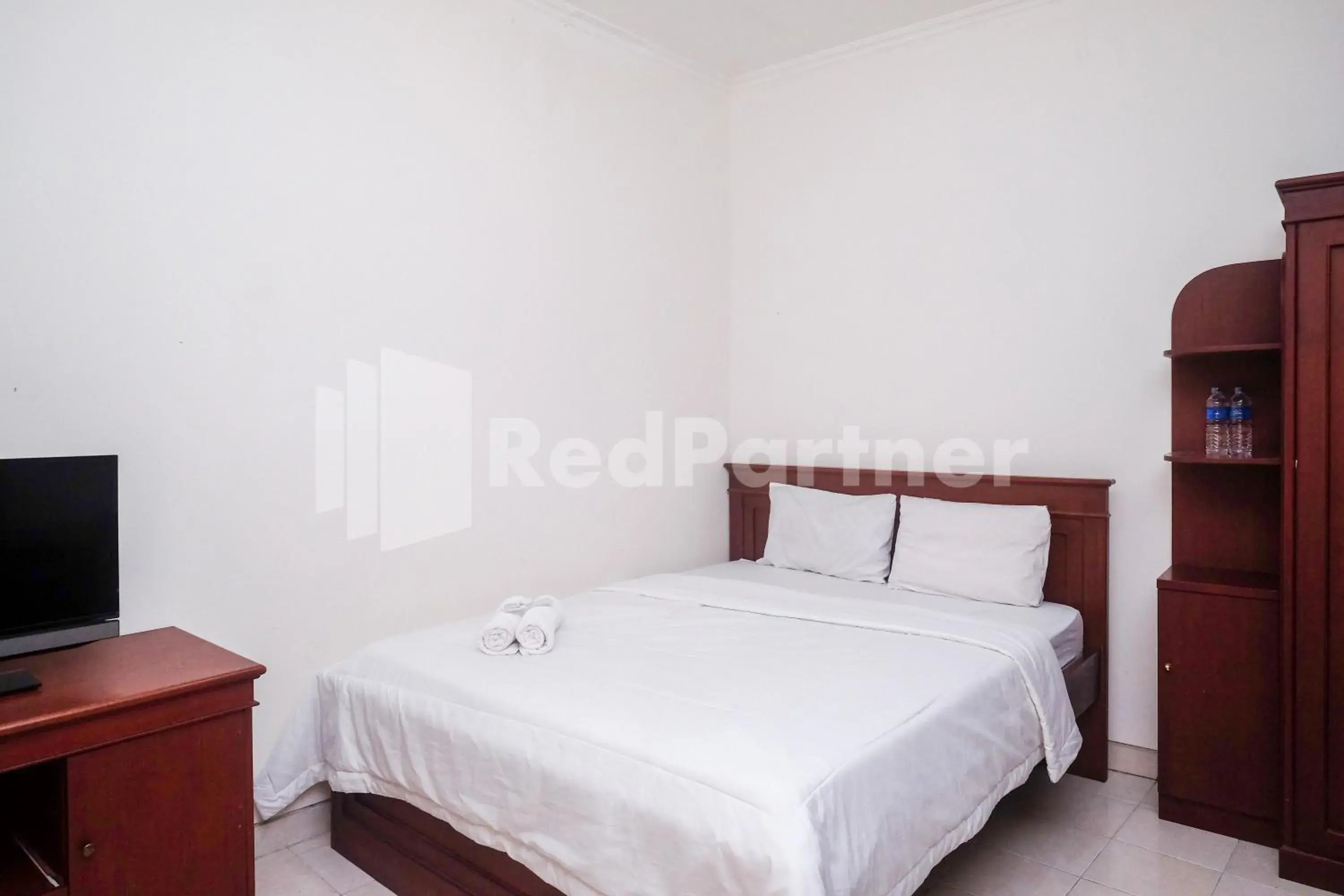 Bed in Griya Fatima Mitra RedDoorz near UGM Bed in Griya Fatima Mitra RedDoorz near UGM