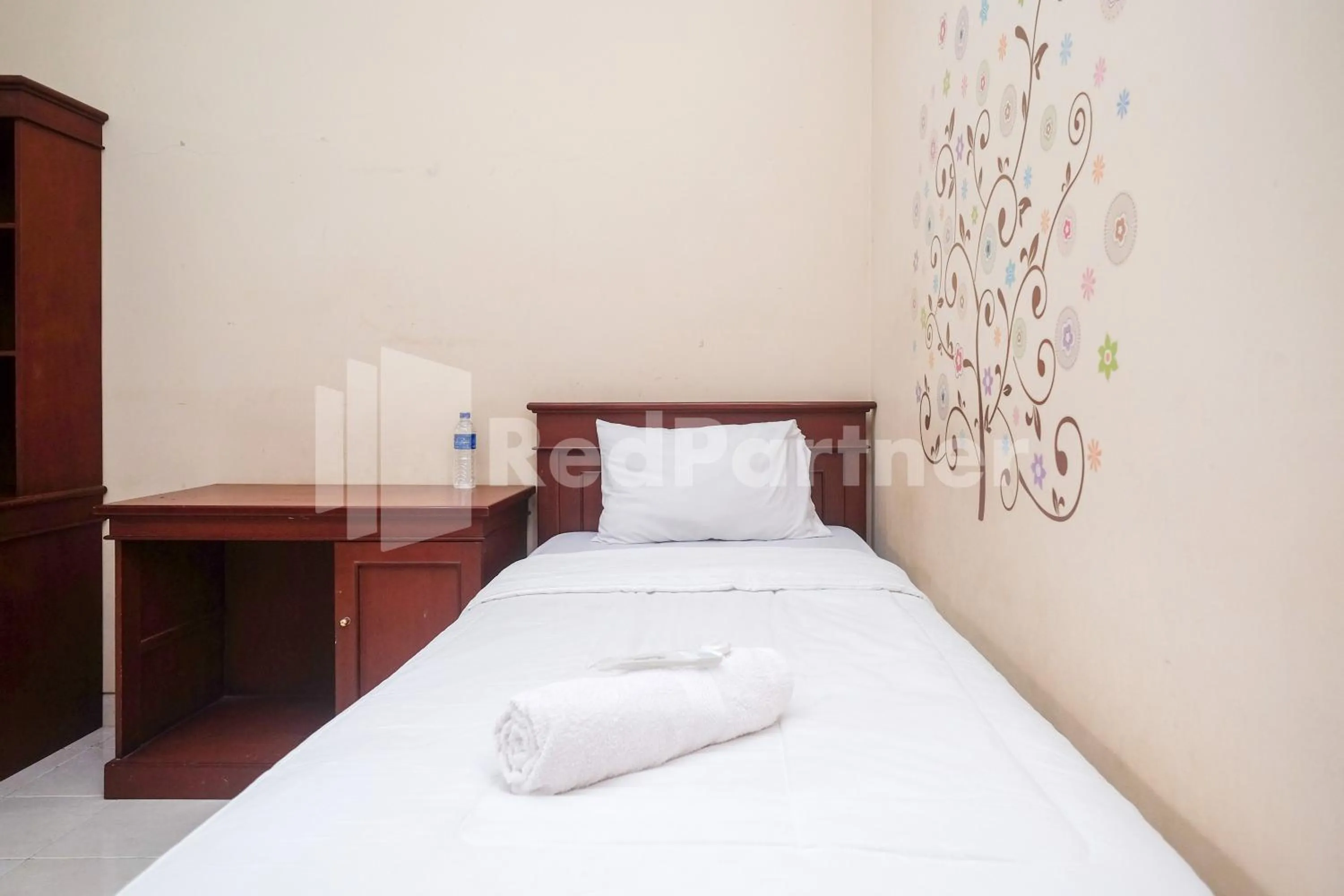 Bed in Griya Fatima Mitra RedDoorz near UGM