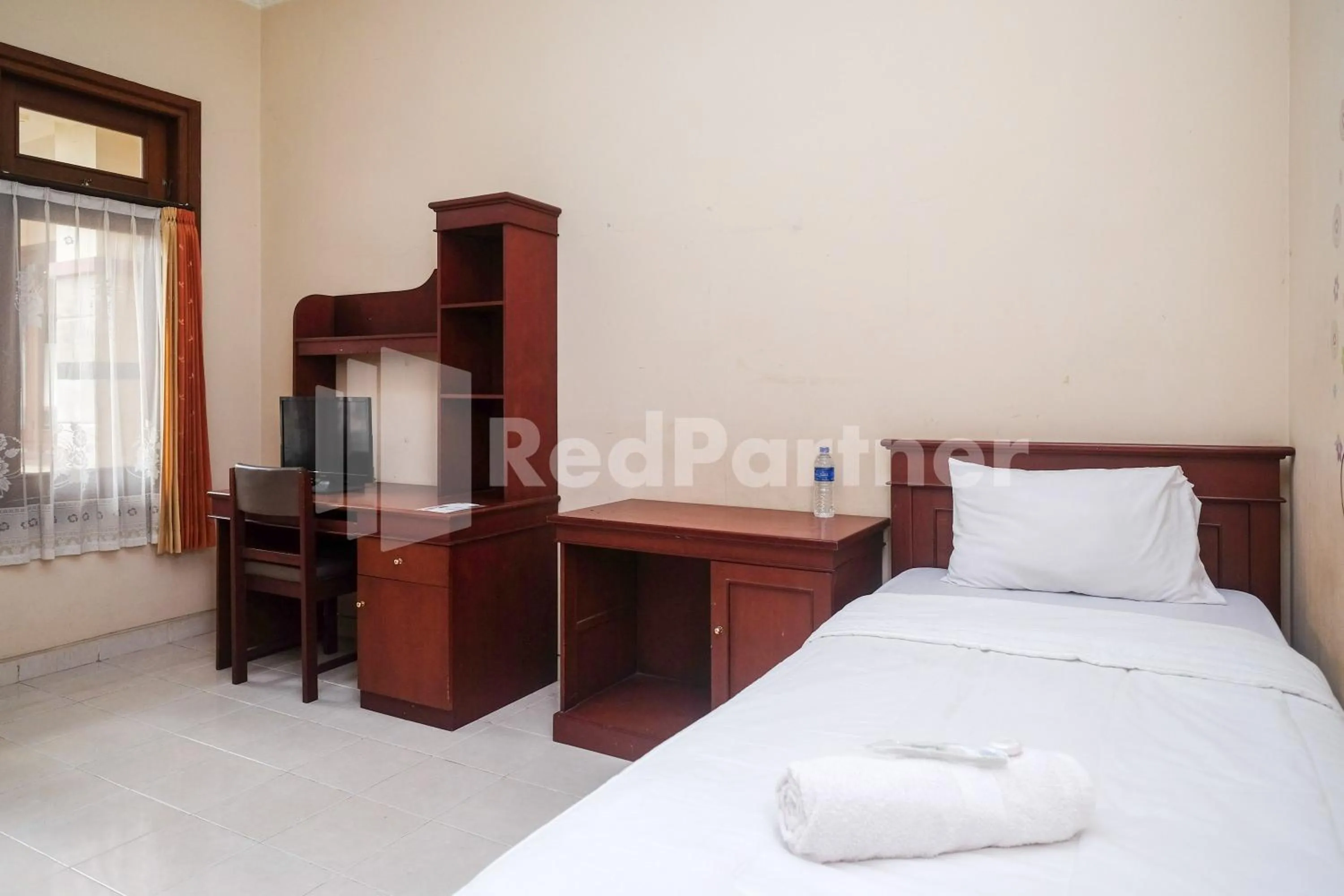 Bed in Griya Fatima Mitra RedDoorz near UGM