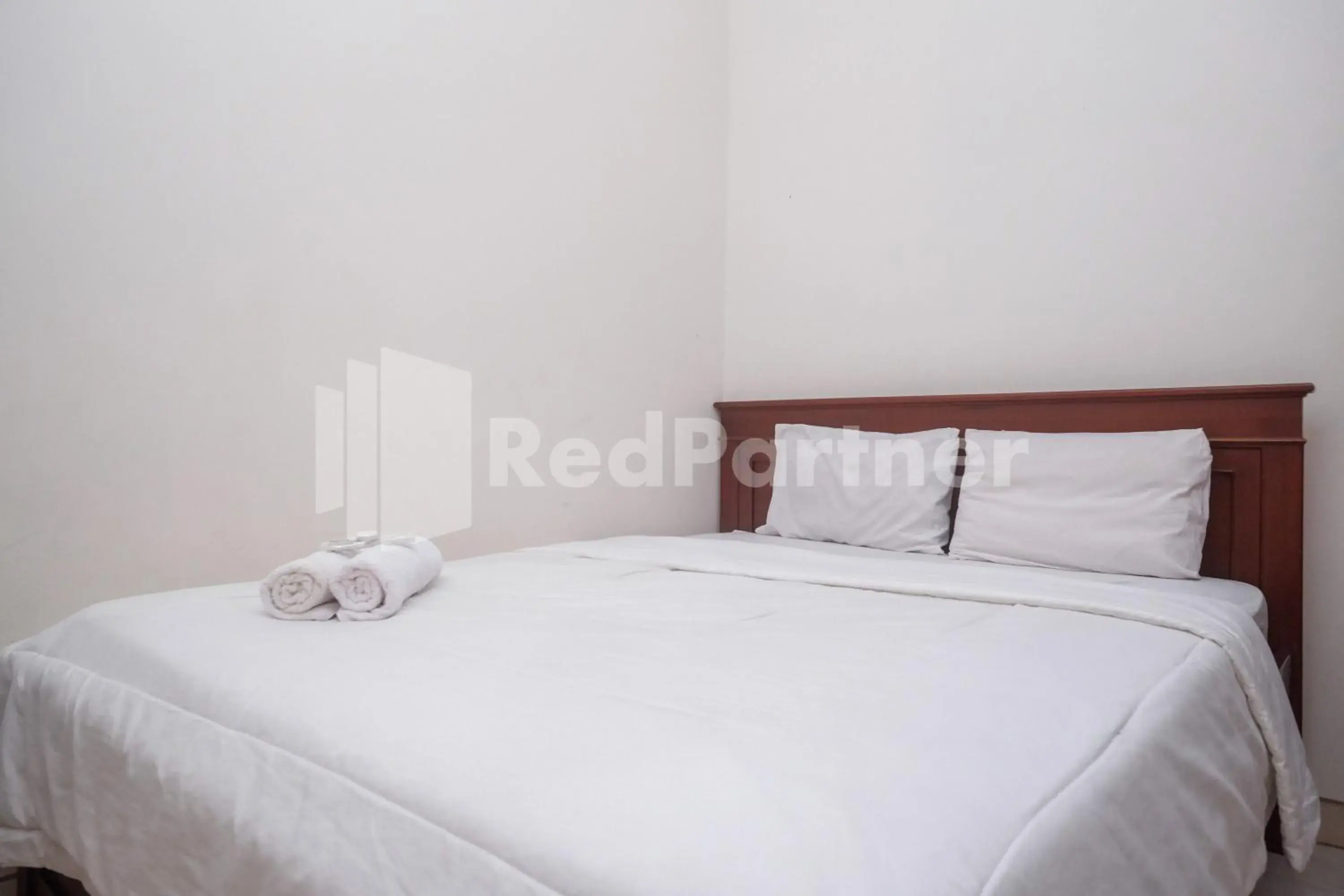 Bed in Griya Fatima Mitra RedDoorz near UGM Bed in Griya Fatima Mitra RedDoorz near UGM