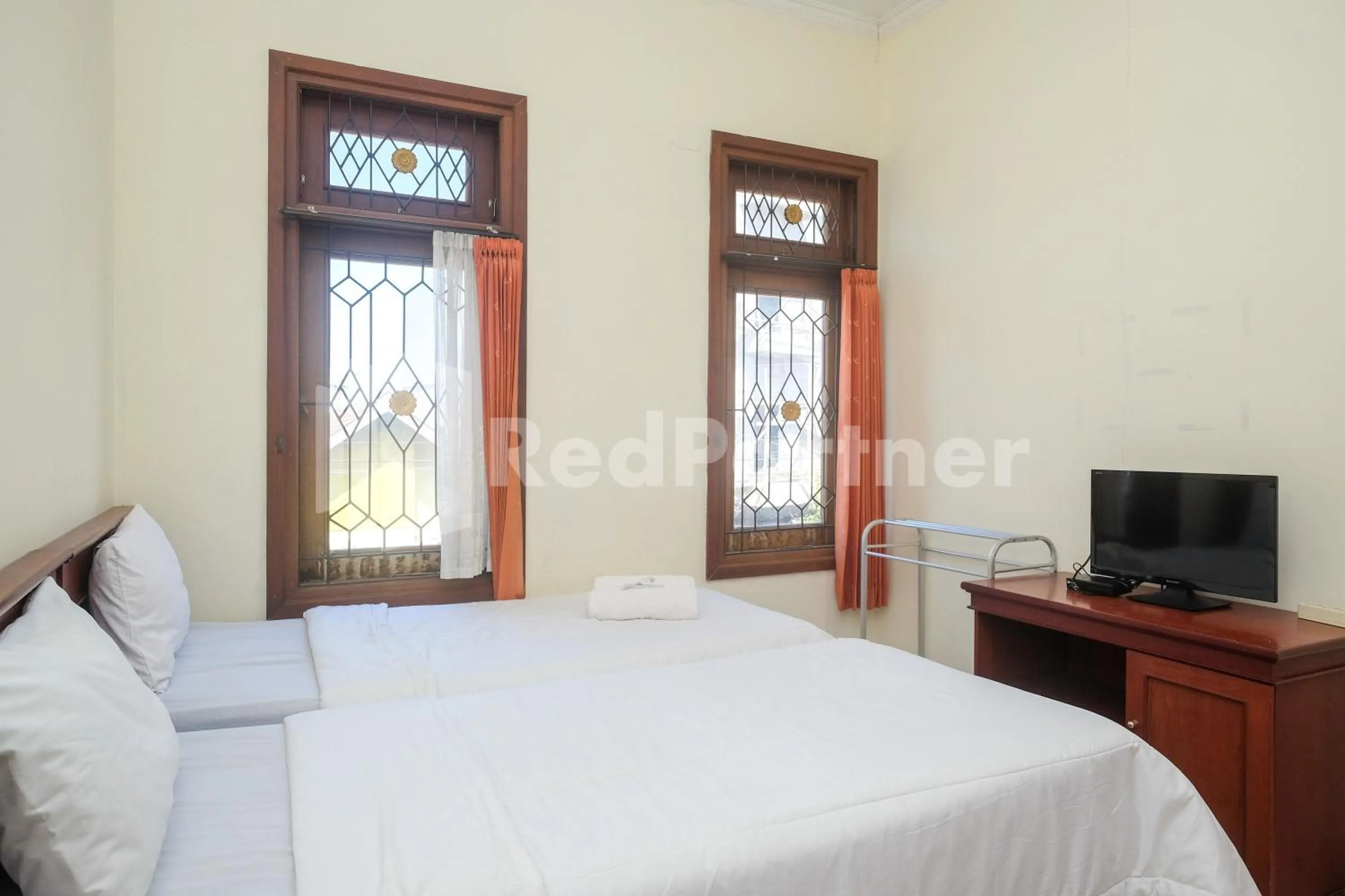 Bed in Griya Fatima Mitra RedDoorz near UGM