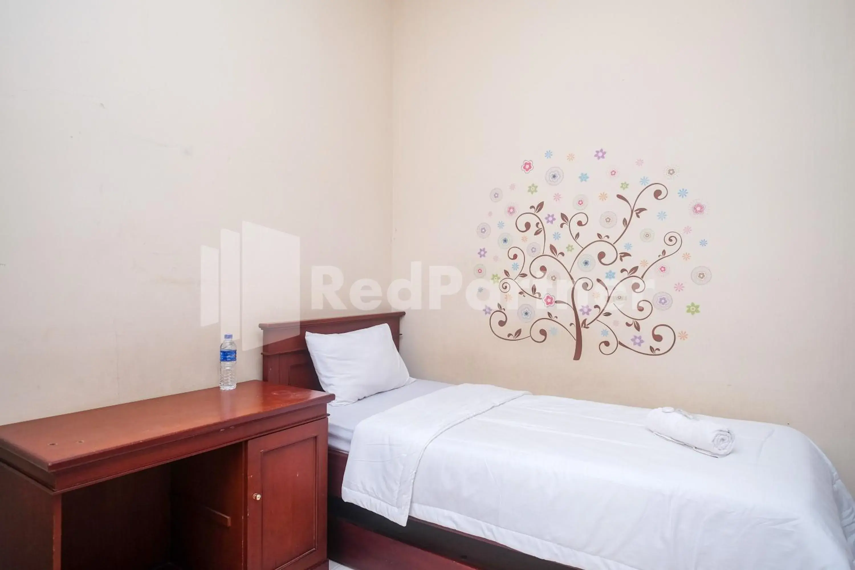 Bed in Griya Fatima Mitra RedDoorz near UGM Bed in Griya Fatima Mitra RedDoorz near UGM