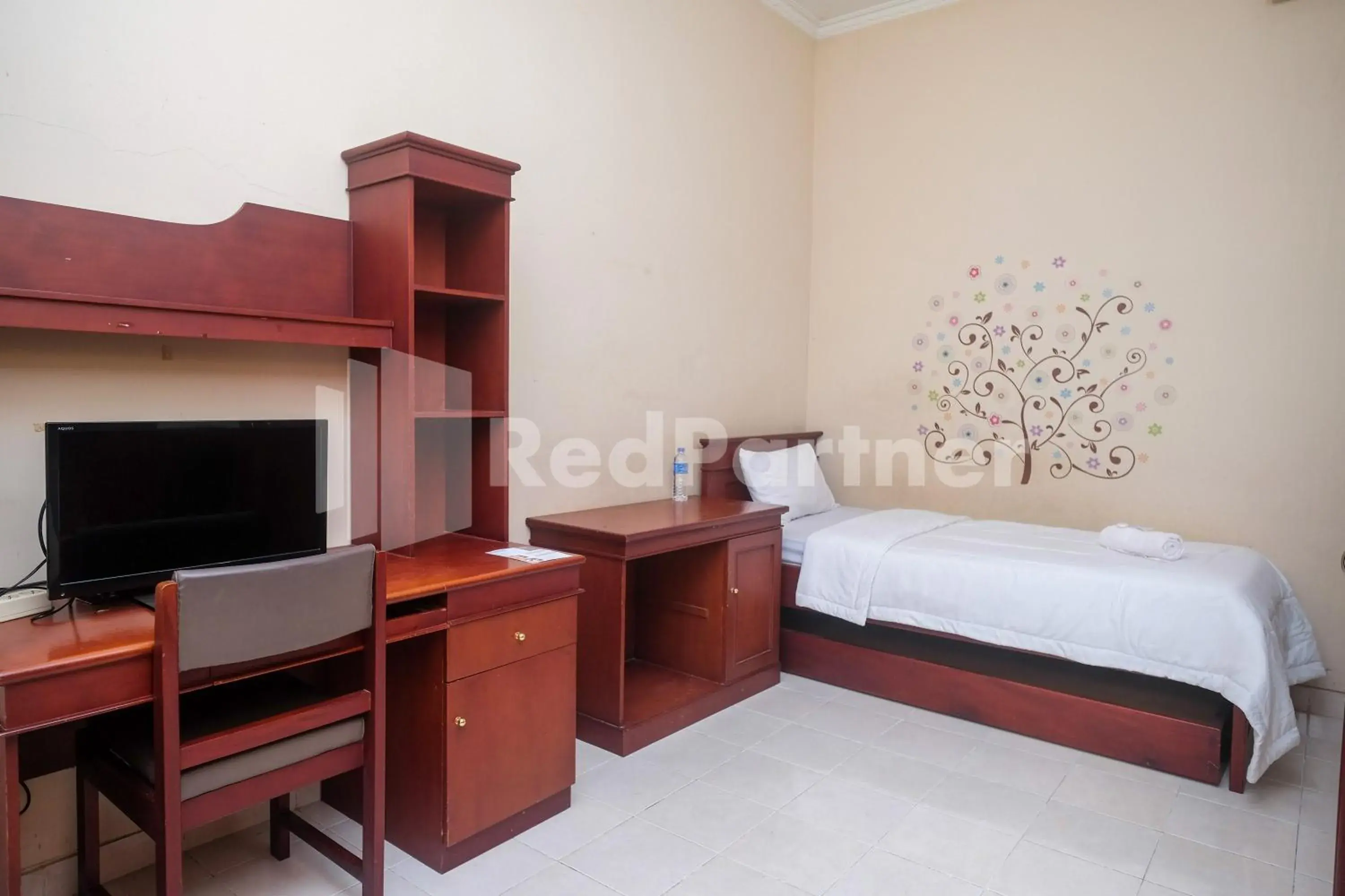 Bed in Griya Fatima Mitra RedDoorz near UGM Bed in Griya Fatima Mitra RedDoorz near UGM