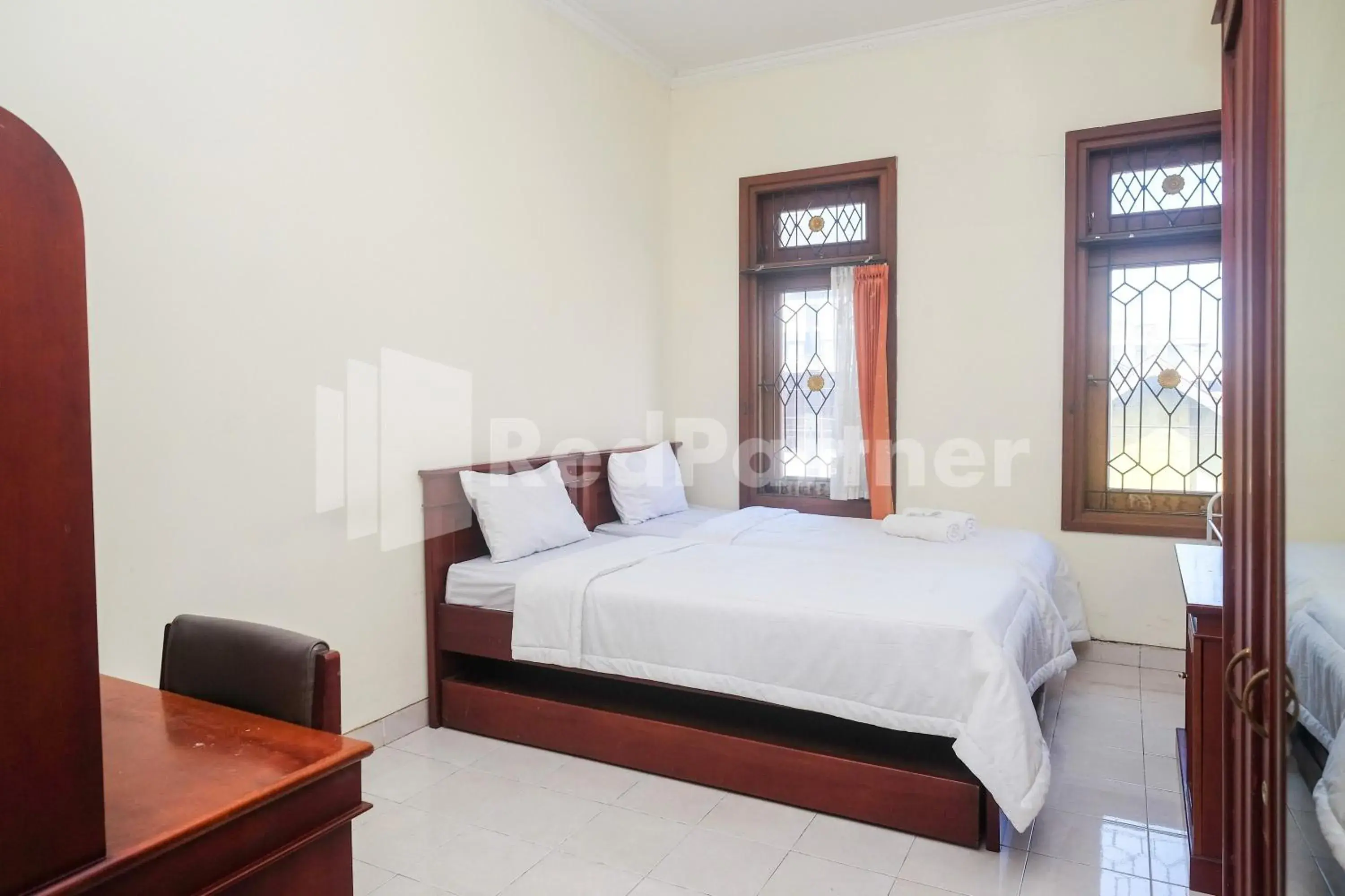 Bed in Griya Fatima Mitra RedDoorz near UGM Bed in Griya Fatima Mitra RedDoorz near UGM