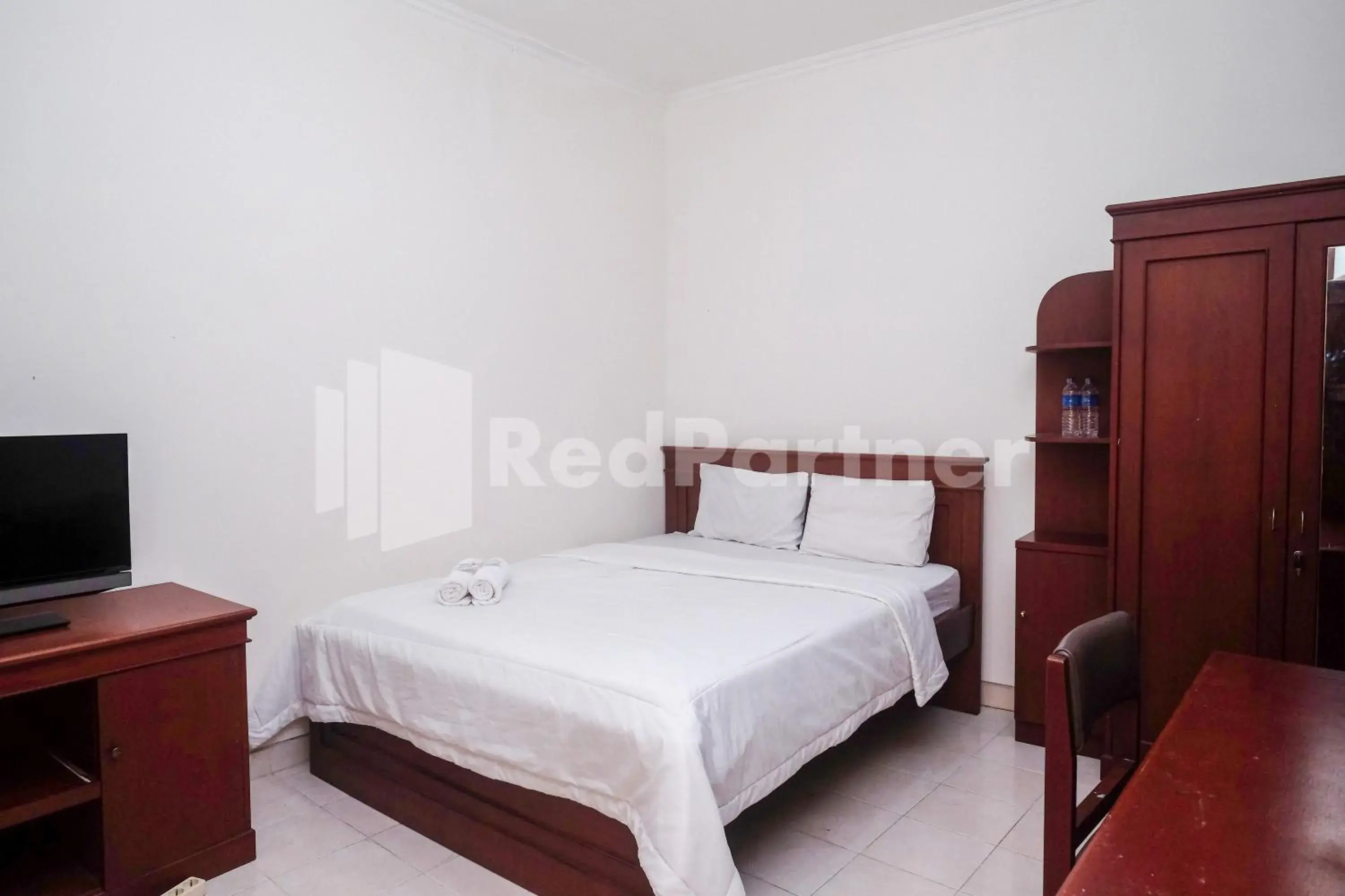 Bed in Griya Fatima Mitra RedDoorz near UGM Bed in Griya Fatima Mitra RedDoorz near UGM