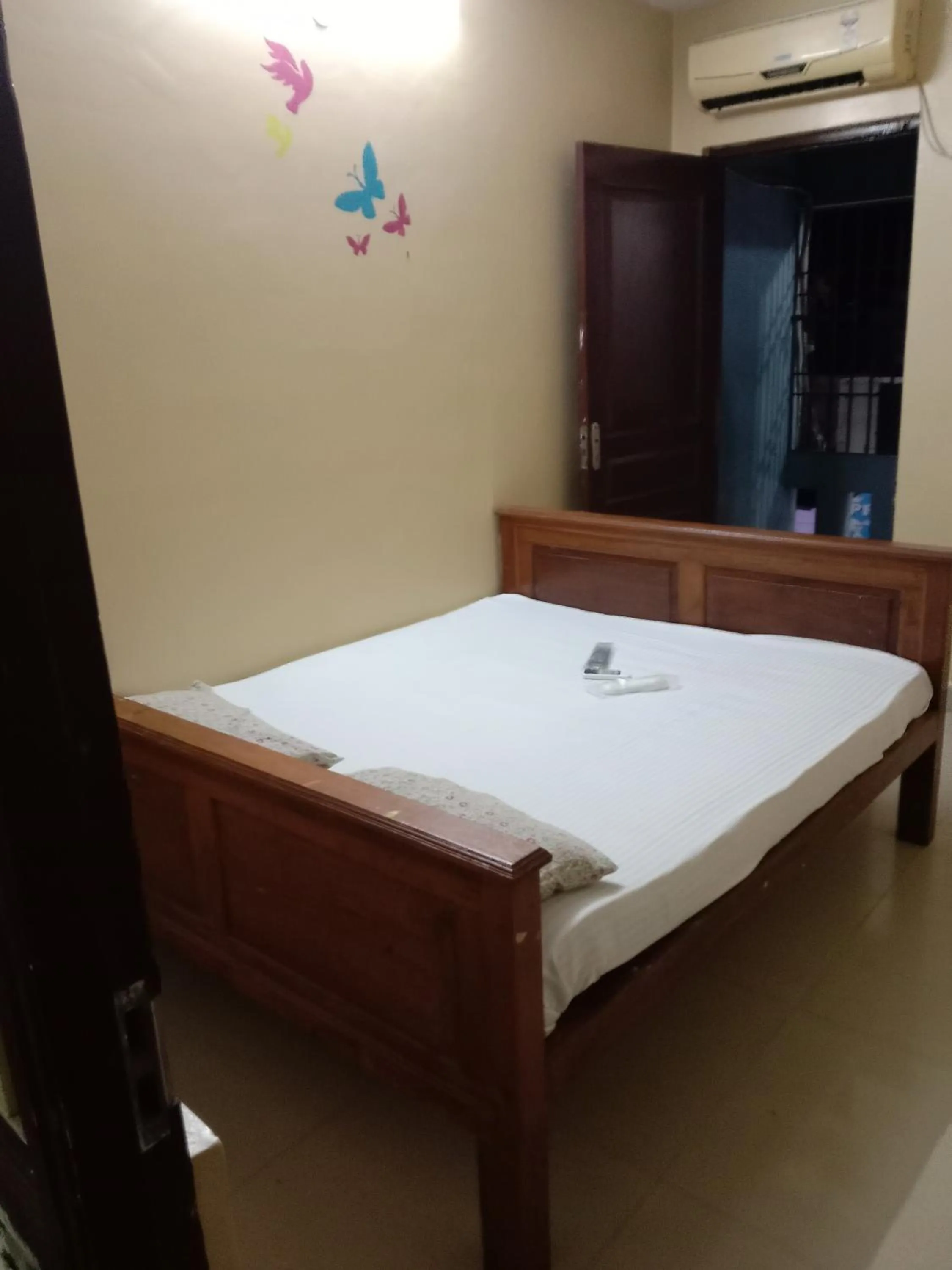 Bed in Sri Krishna Guest House