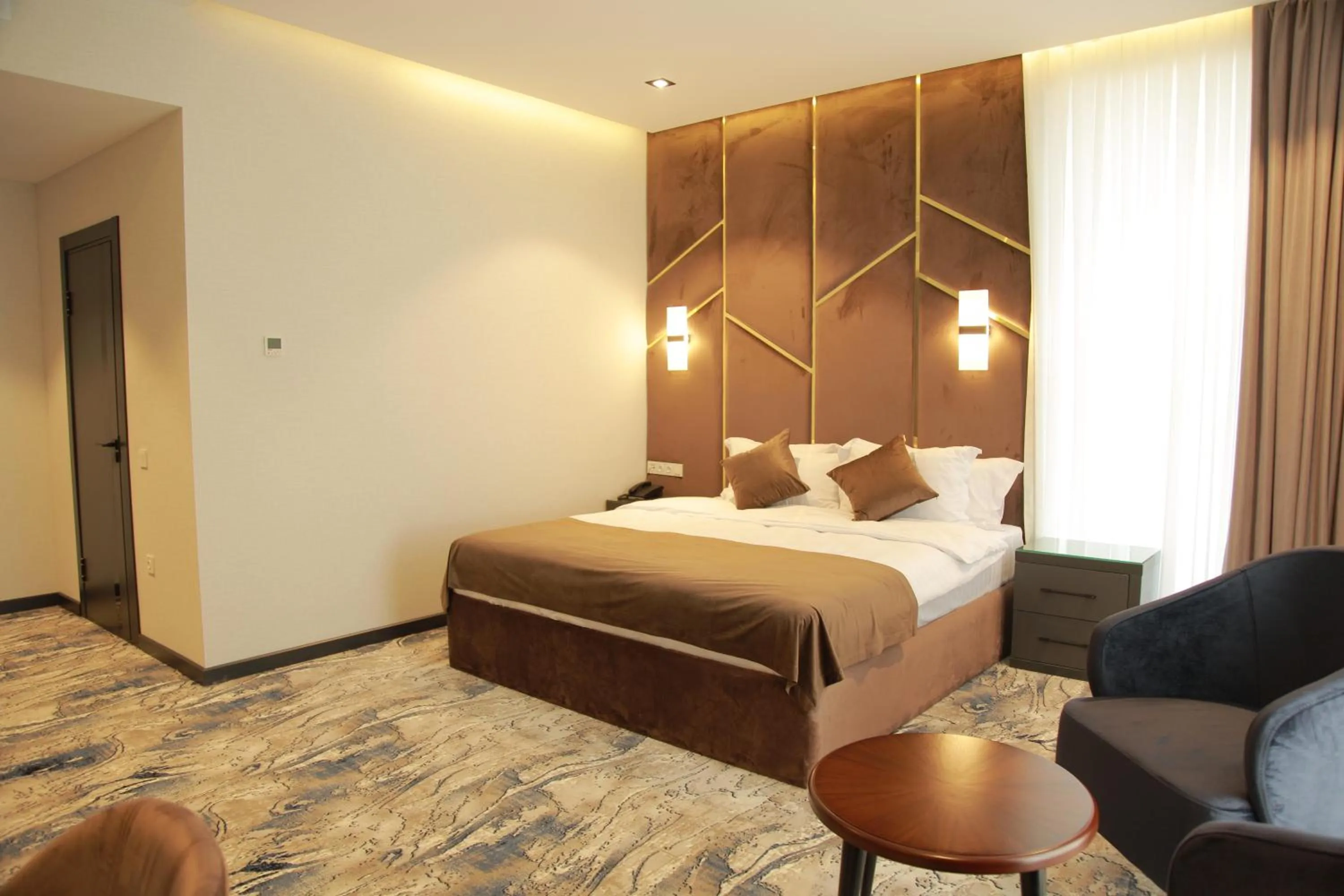 Photo of the whole room, Bed in UNIQUE HOTEL