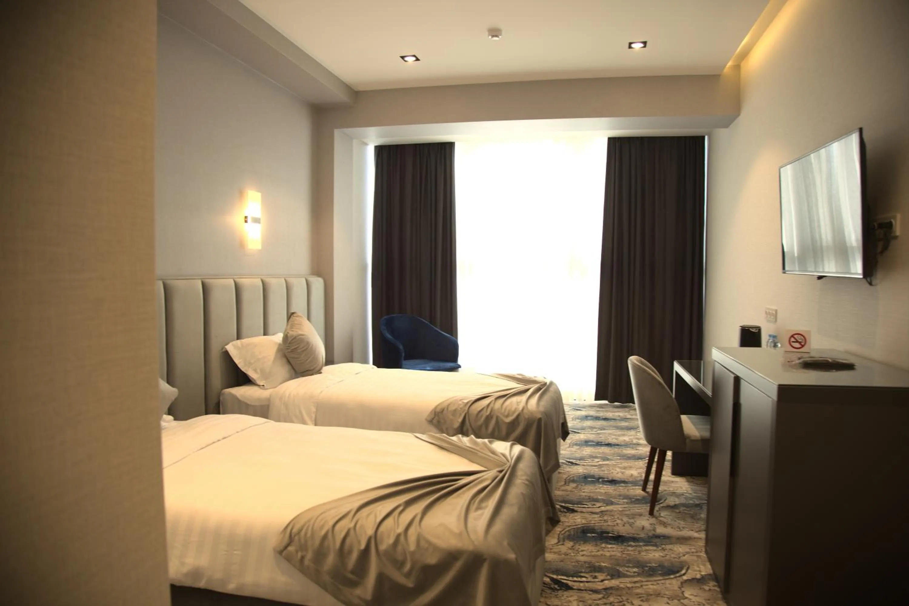 Photo of the whole room, Bed in UNIQUE HOTEL