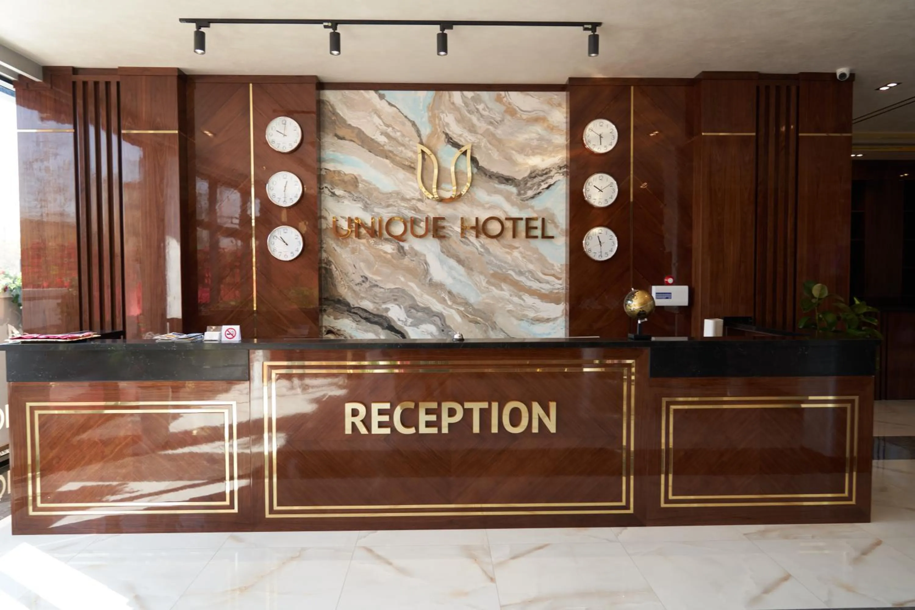 Lobby or reception in UNIQUE HOTEL