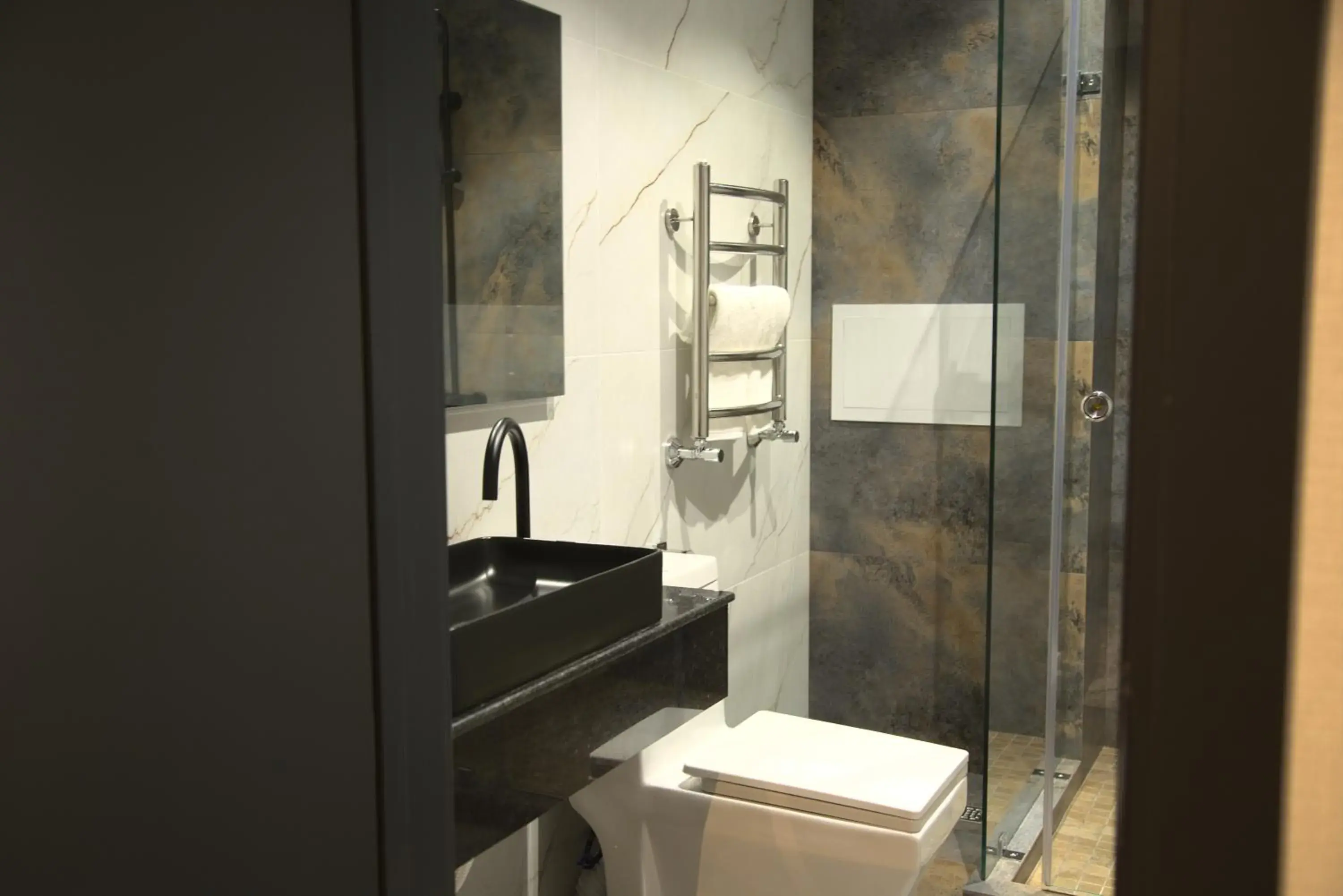 Bathroom in UNIQUE HOTEL Bathroom in UNIQUE HOTEL