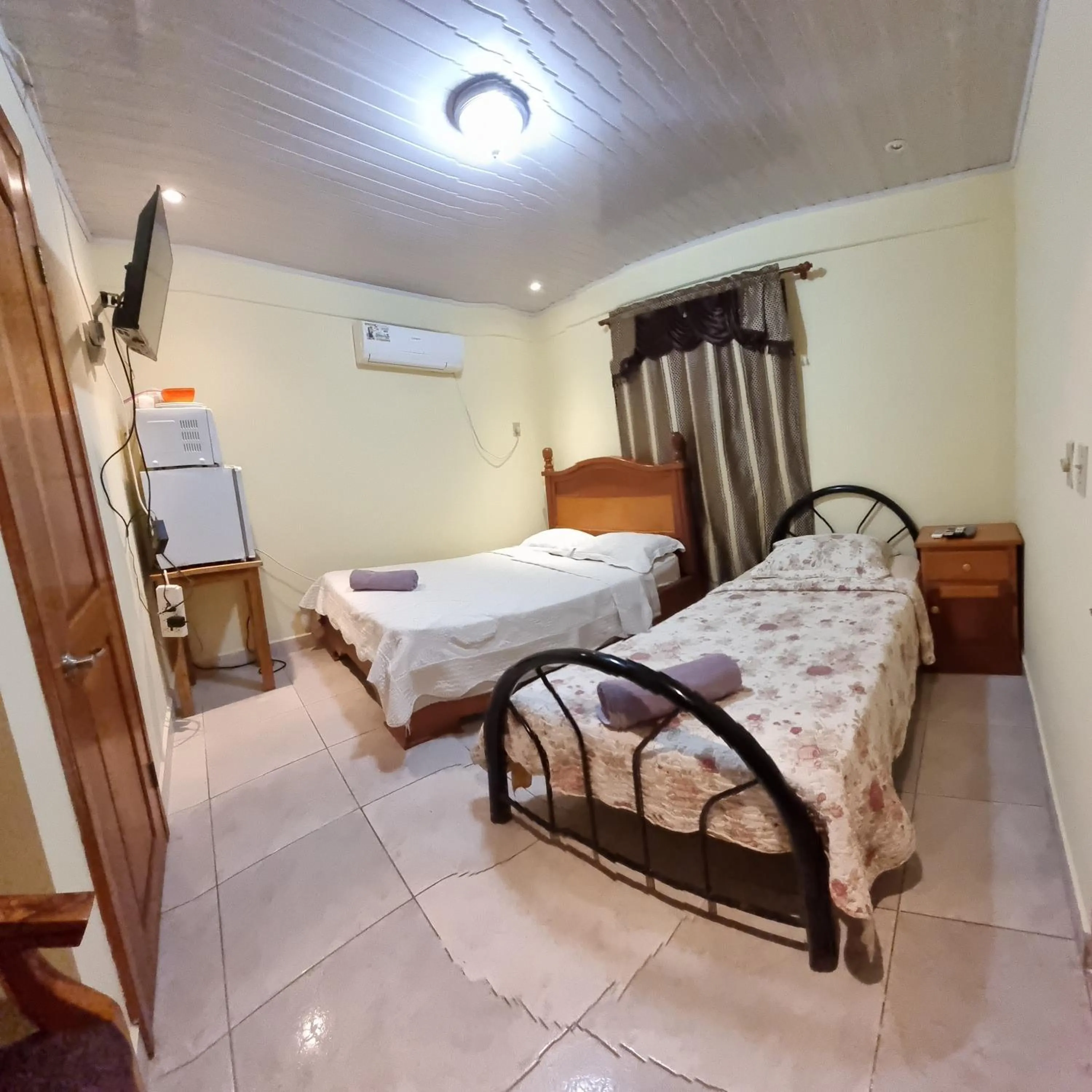 Bed in Hostal Bocas Tropical Paradise