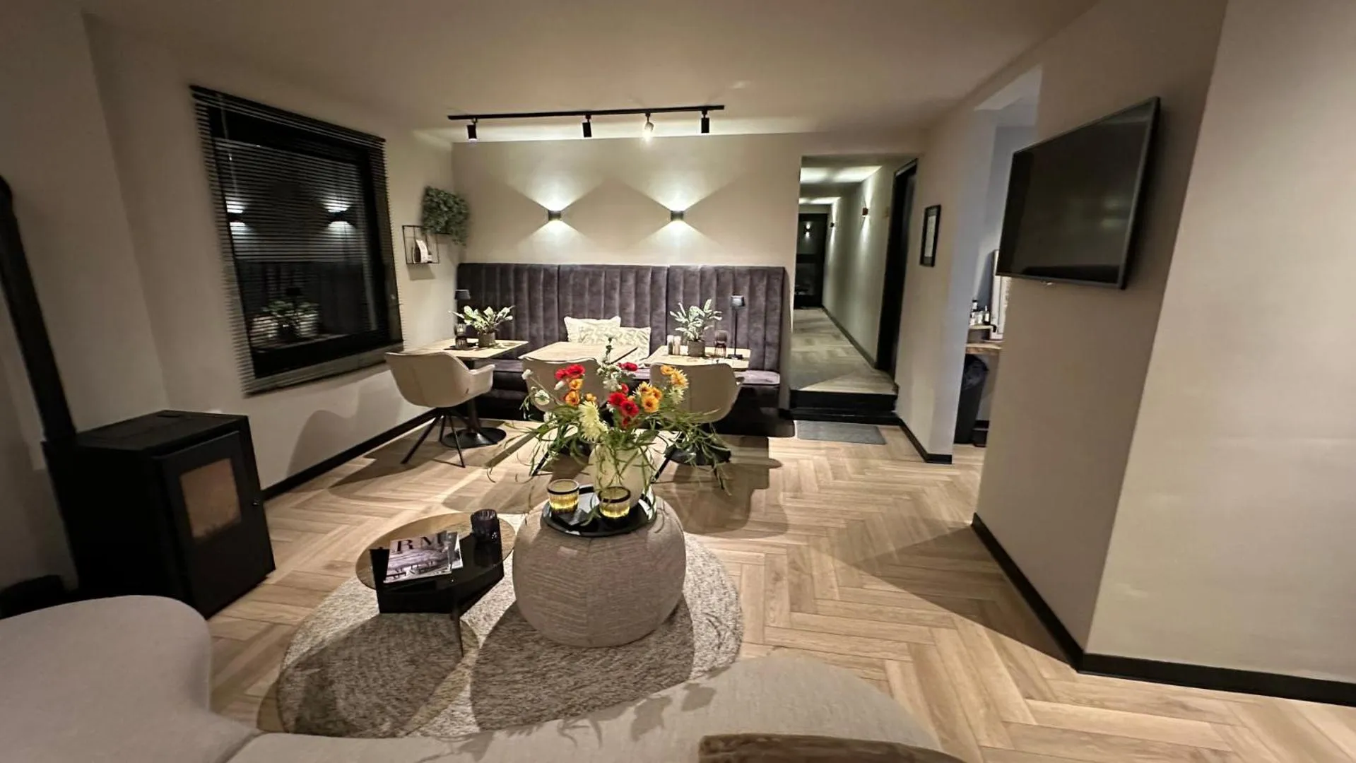 Communal lounge/ TV room in Boutique Hotel Le Faucon