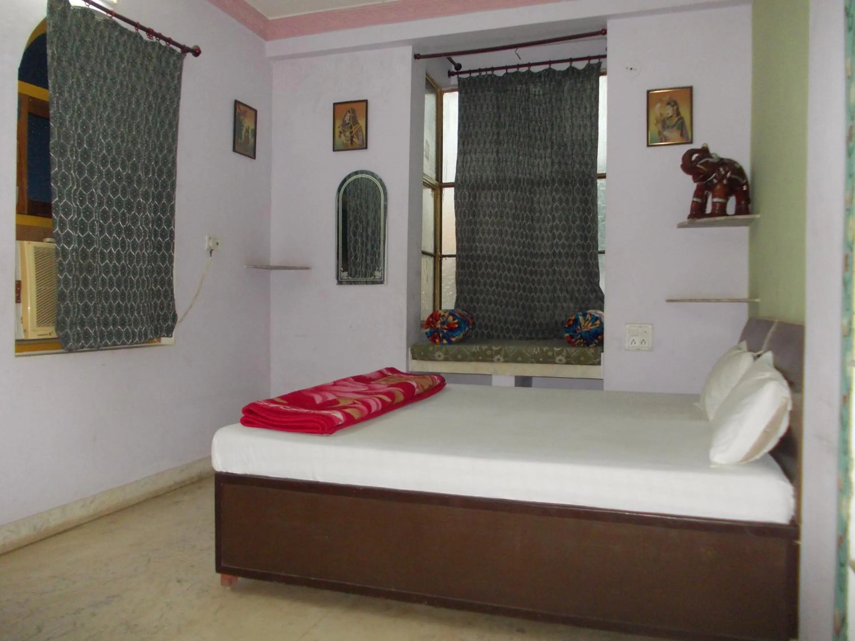 Photo of the whole room, Bed in Raj Mahal Guest House