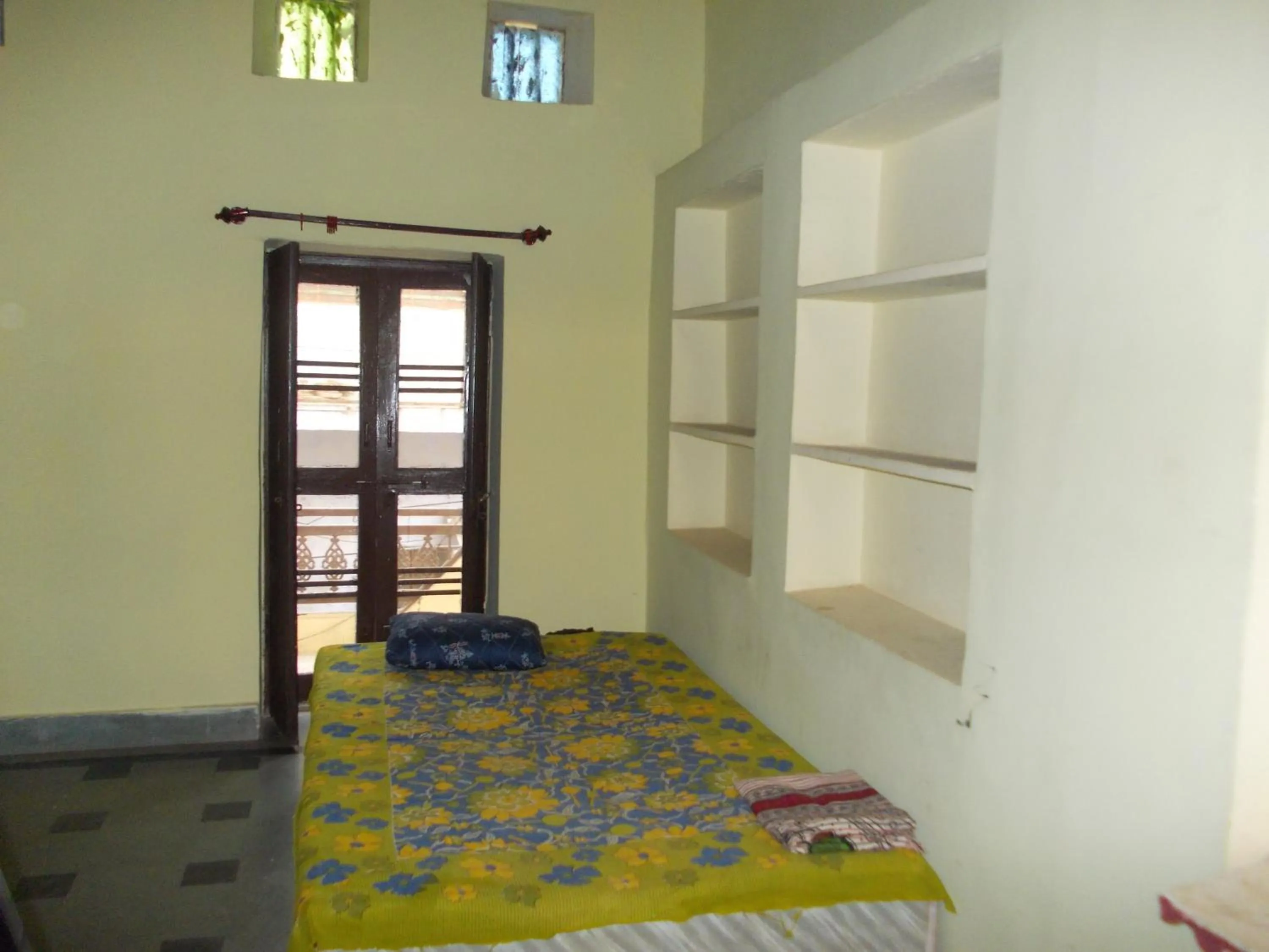 Bed in Raj Mahal Guest House
