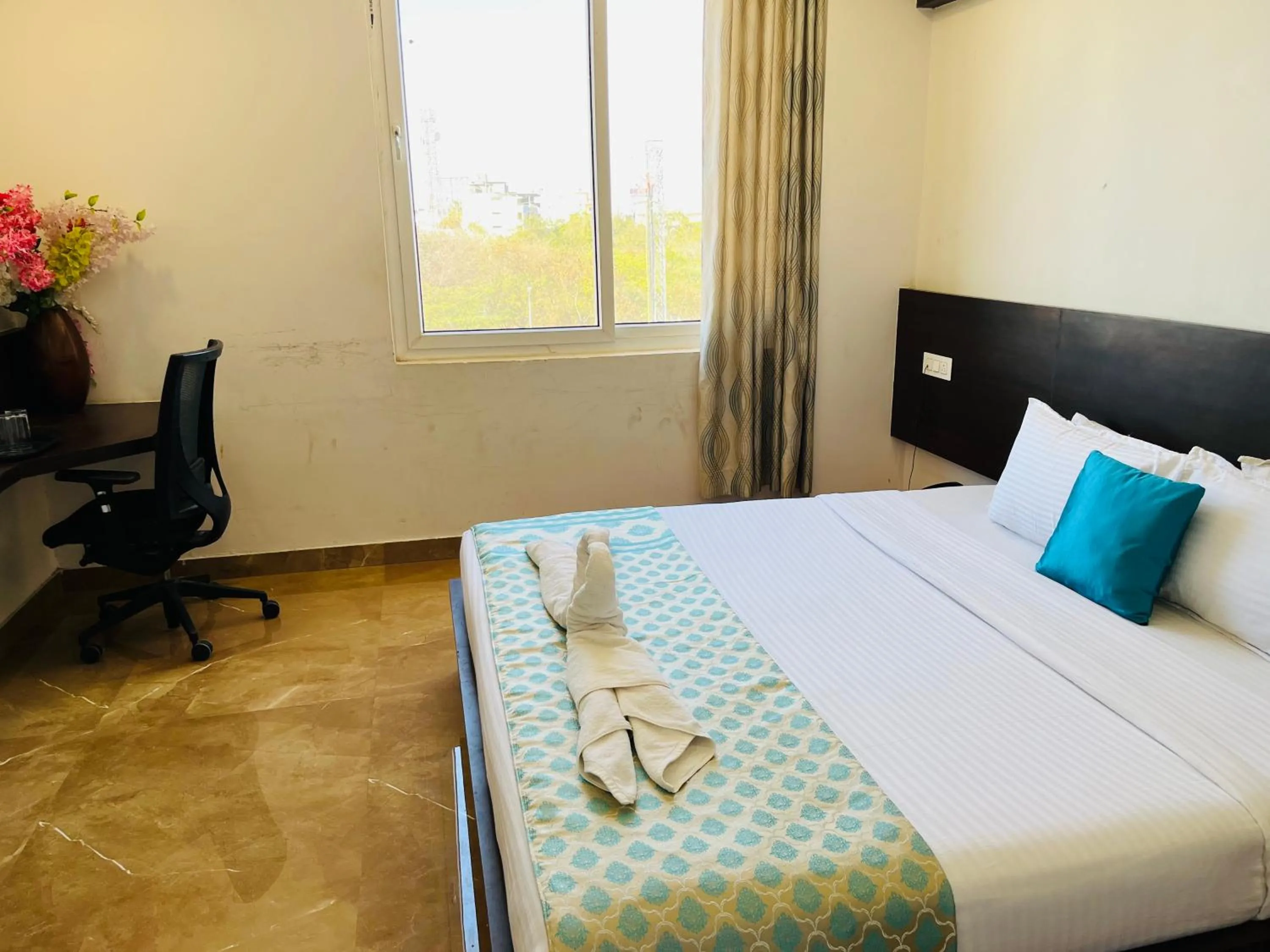 Bed in Hotel Elite By Signature Group