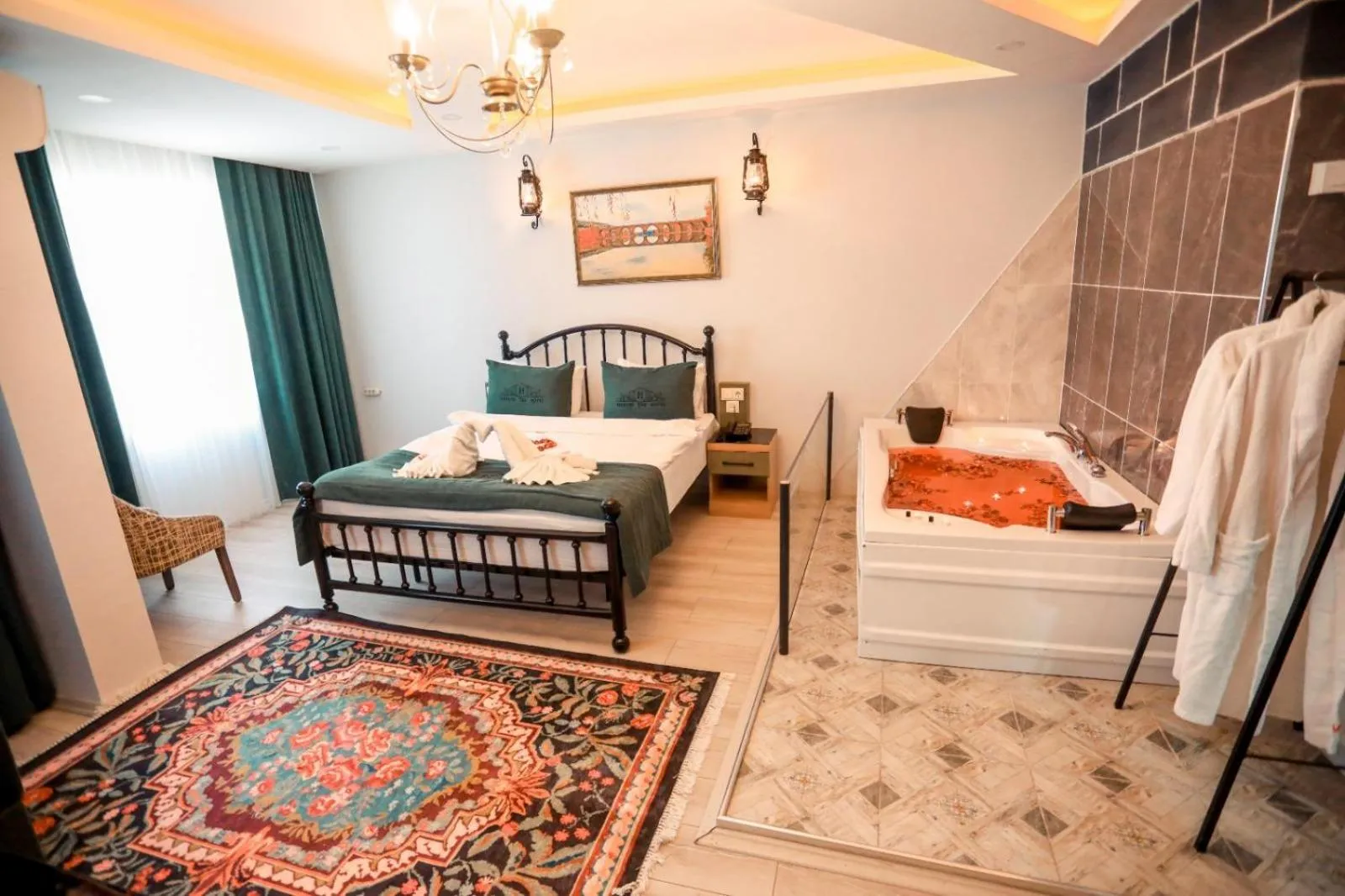 Bed in HASUNİ TAŞ HOTEL